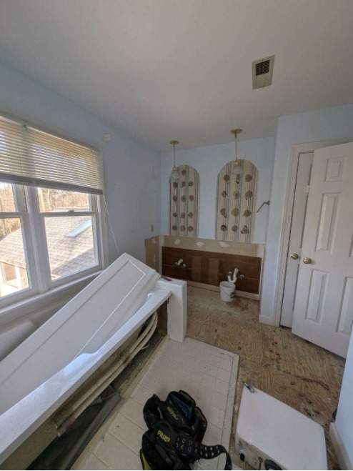 From Cramped & Carpeted to Bright & Modern: A Cary Bathroom Transformation by Elite Remodeling and Design LLC