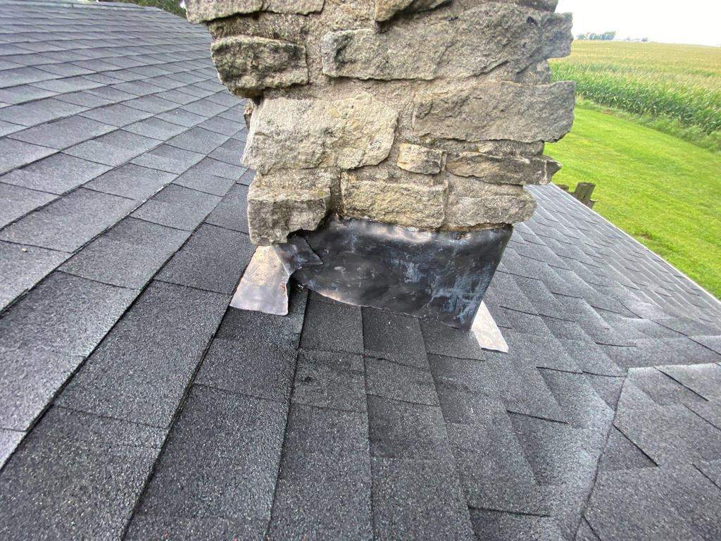 Storm damage roof replacement by Nitro Roofing and Construction