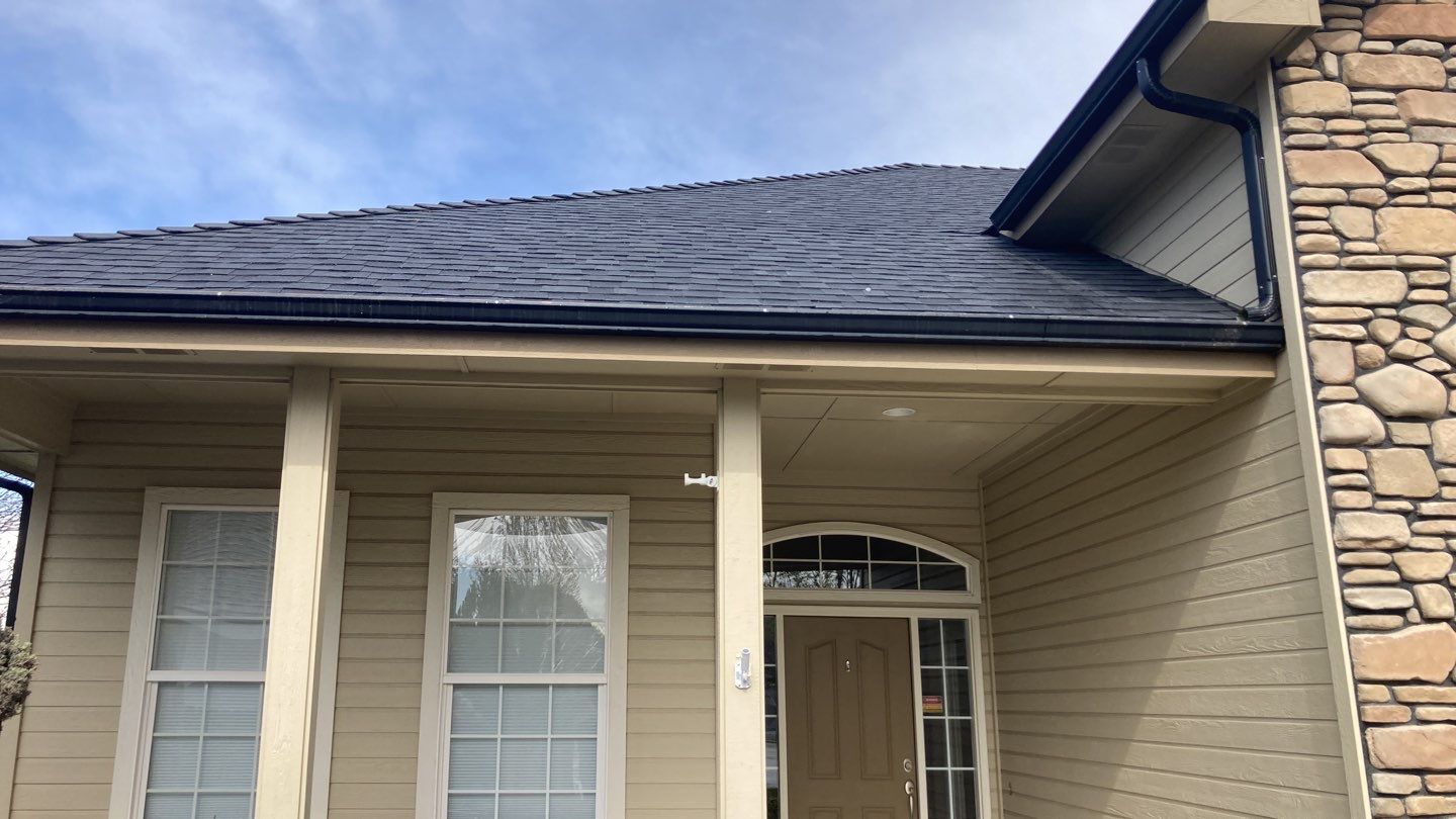 Beautifully maintained two story home with Duration Onyx Black located in Meridian by ID Roofing LLC