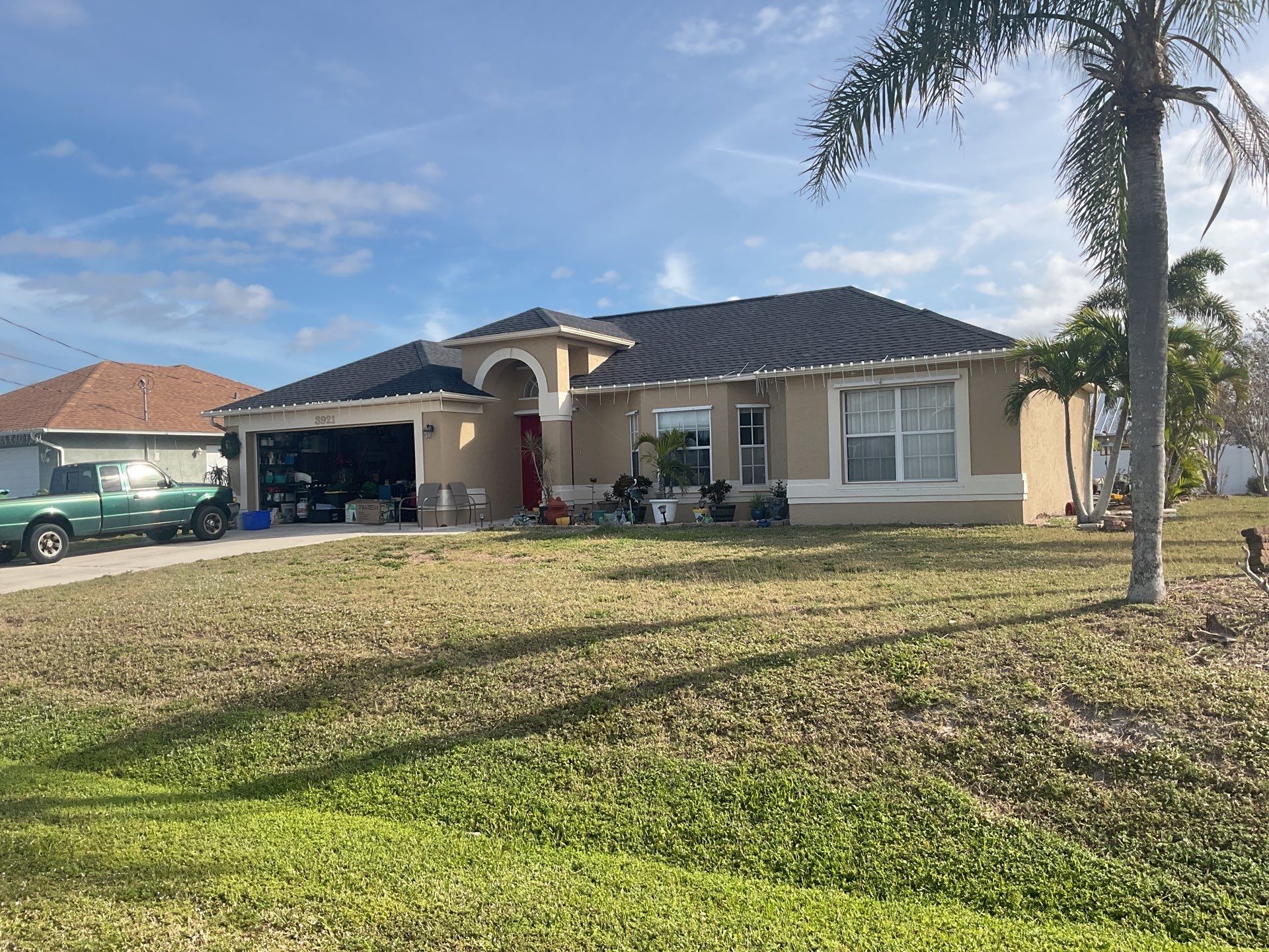 Black Seamless Gutters for Modern Cape Coral Homes by Gutter Professors