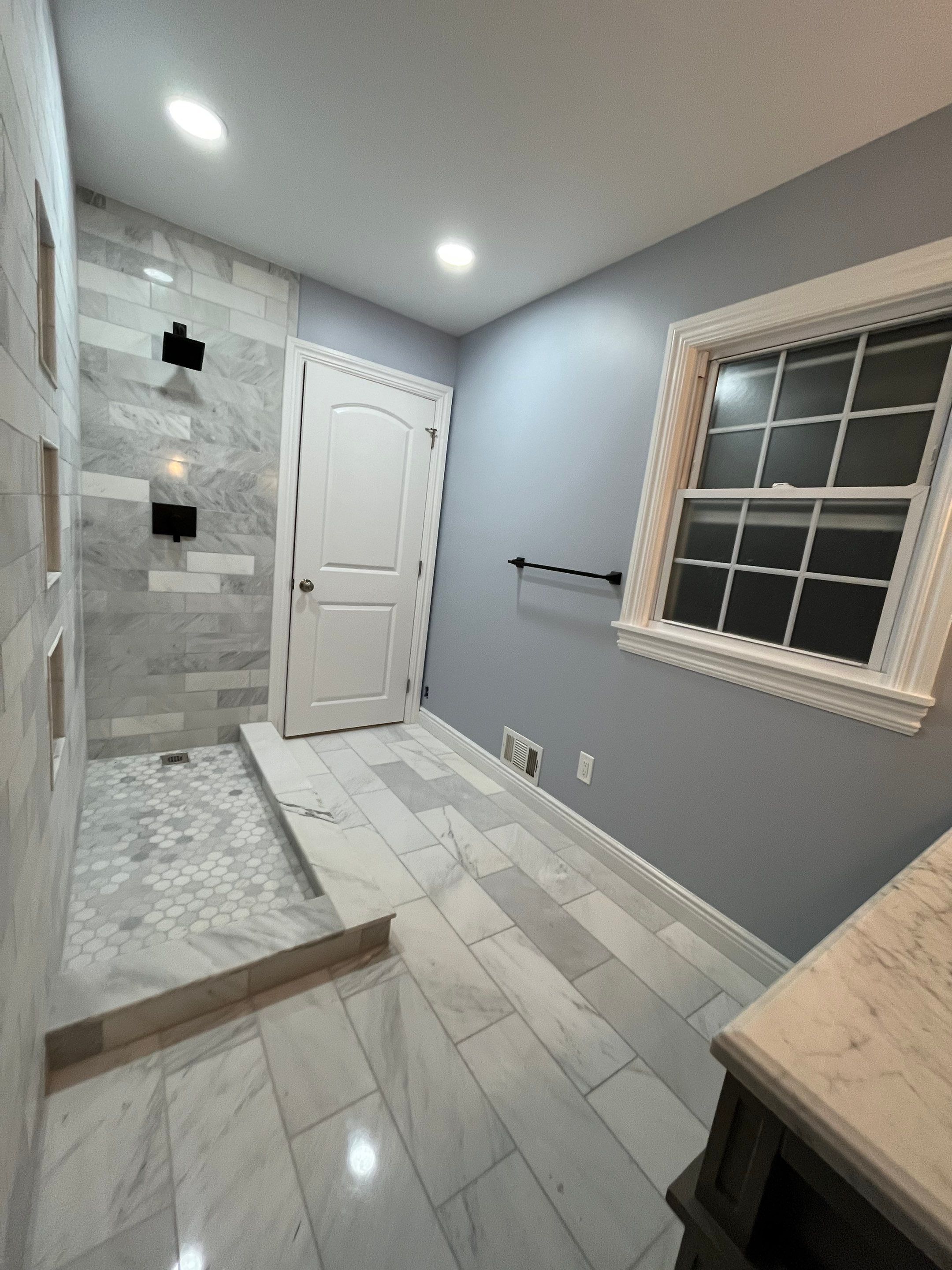 Bathroom Remodel using Tile by Home Concepts Construction