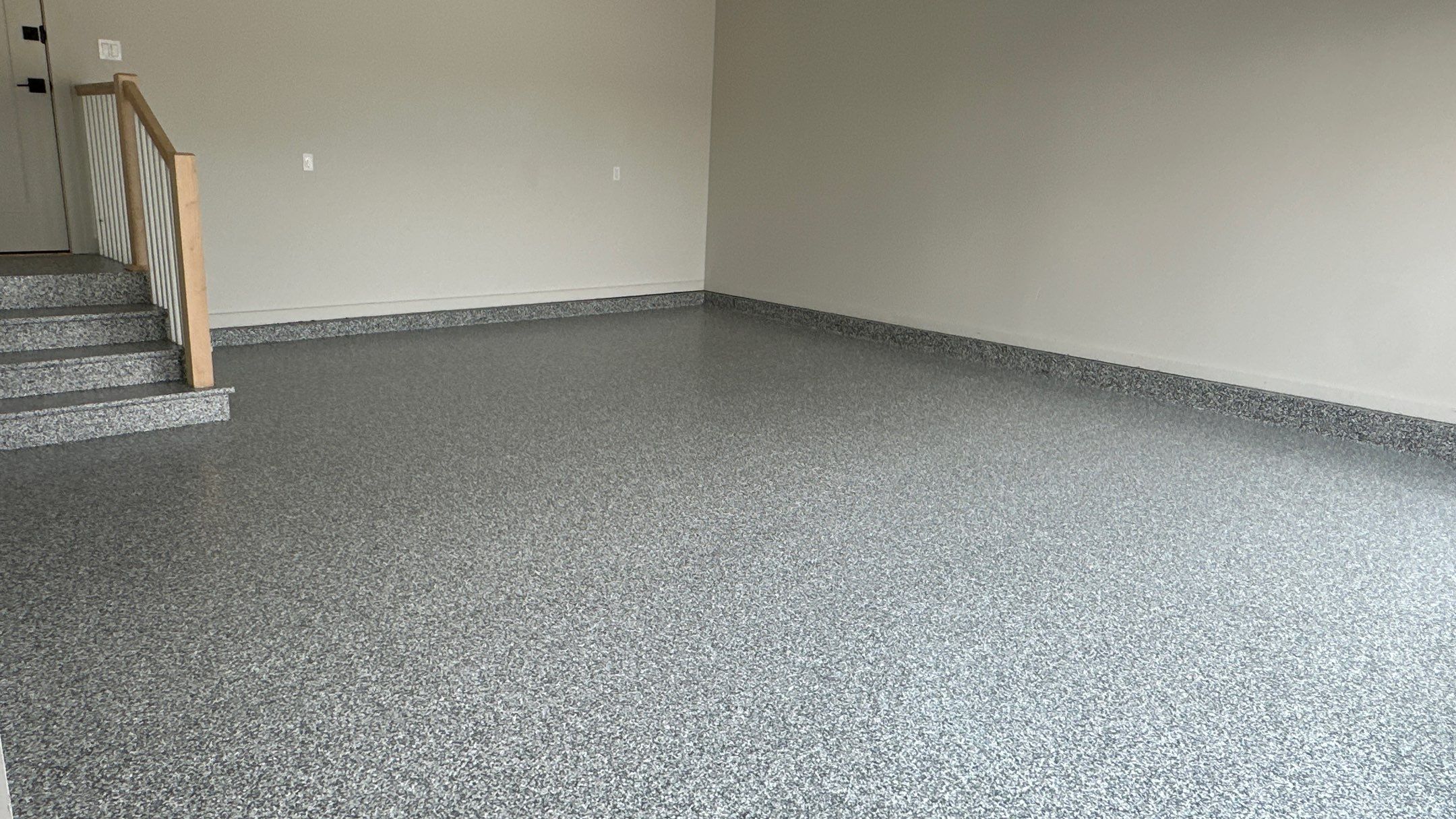 Check out how beautiful a brand new stonehenge flake floor looks by Banner Garage