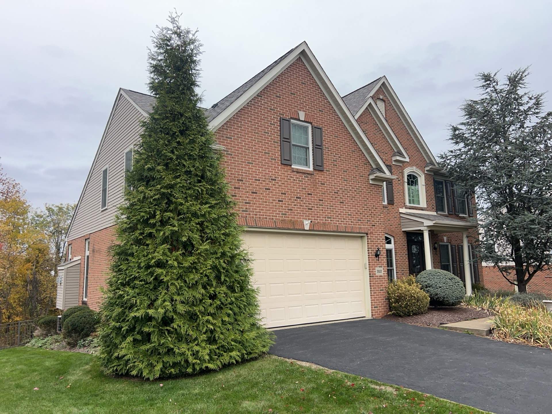 Partial Siding Renovation with Tan Vinyl Siding in Canonsburg by Ideal Siding Pittsburgh