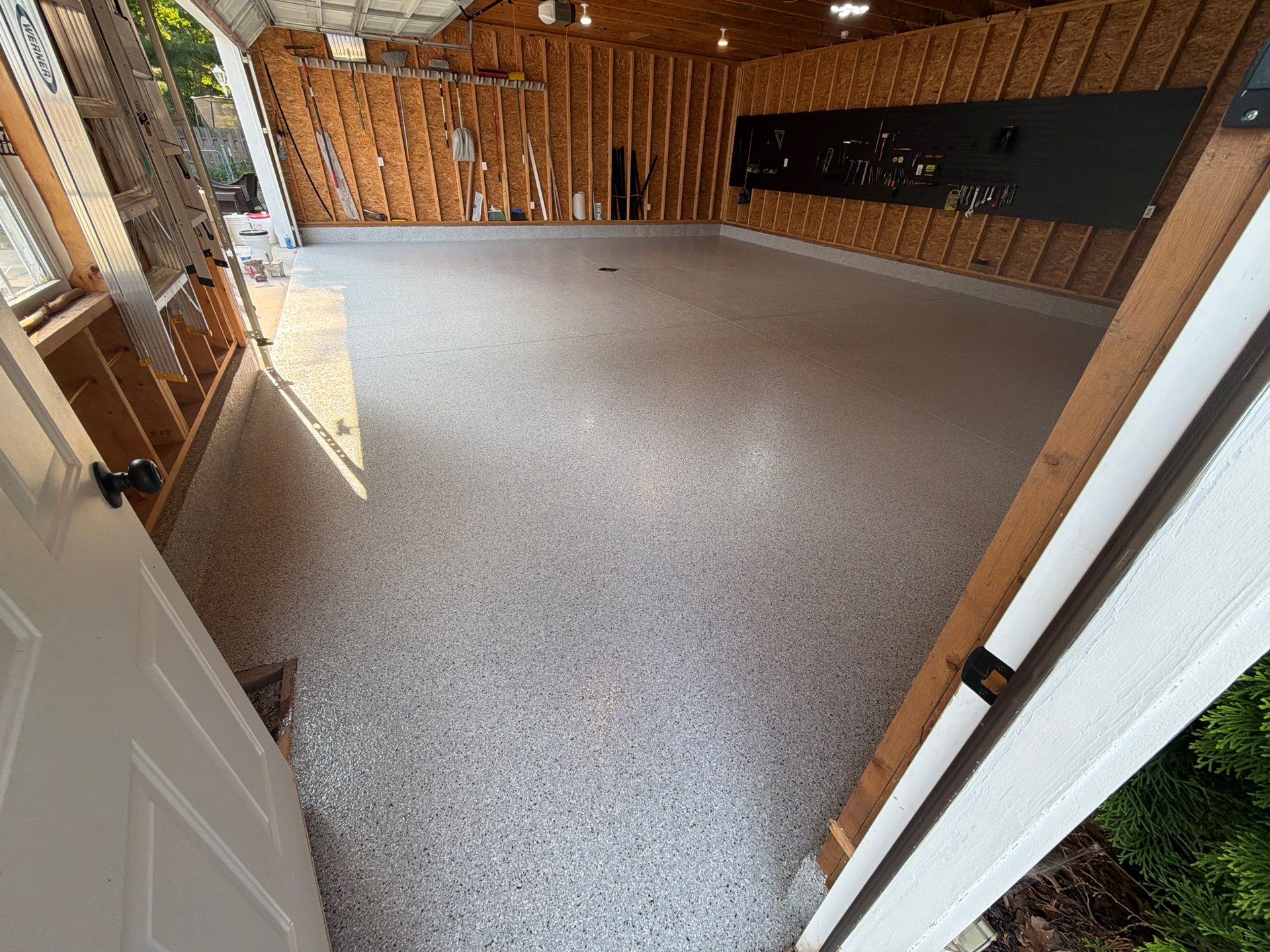 Custom Epoxy Flake Garage Floor Installation in Norton Shores by Gordon Painting