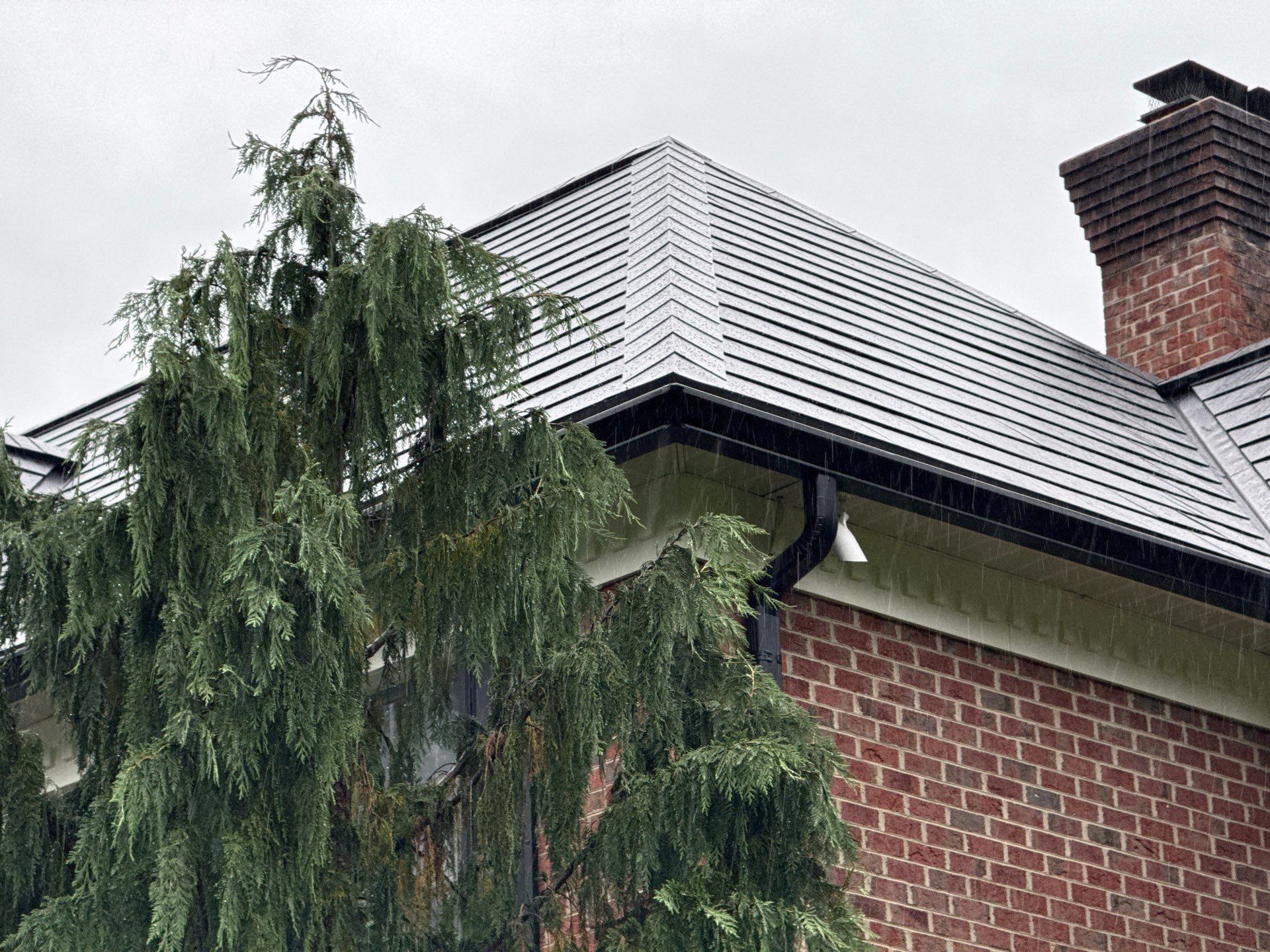 Tesla Solar Roof Replacement  by American Home Contractors