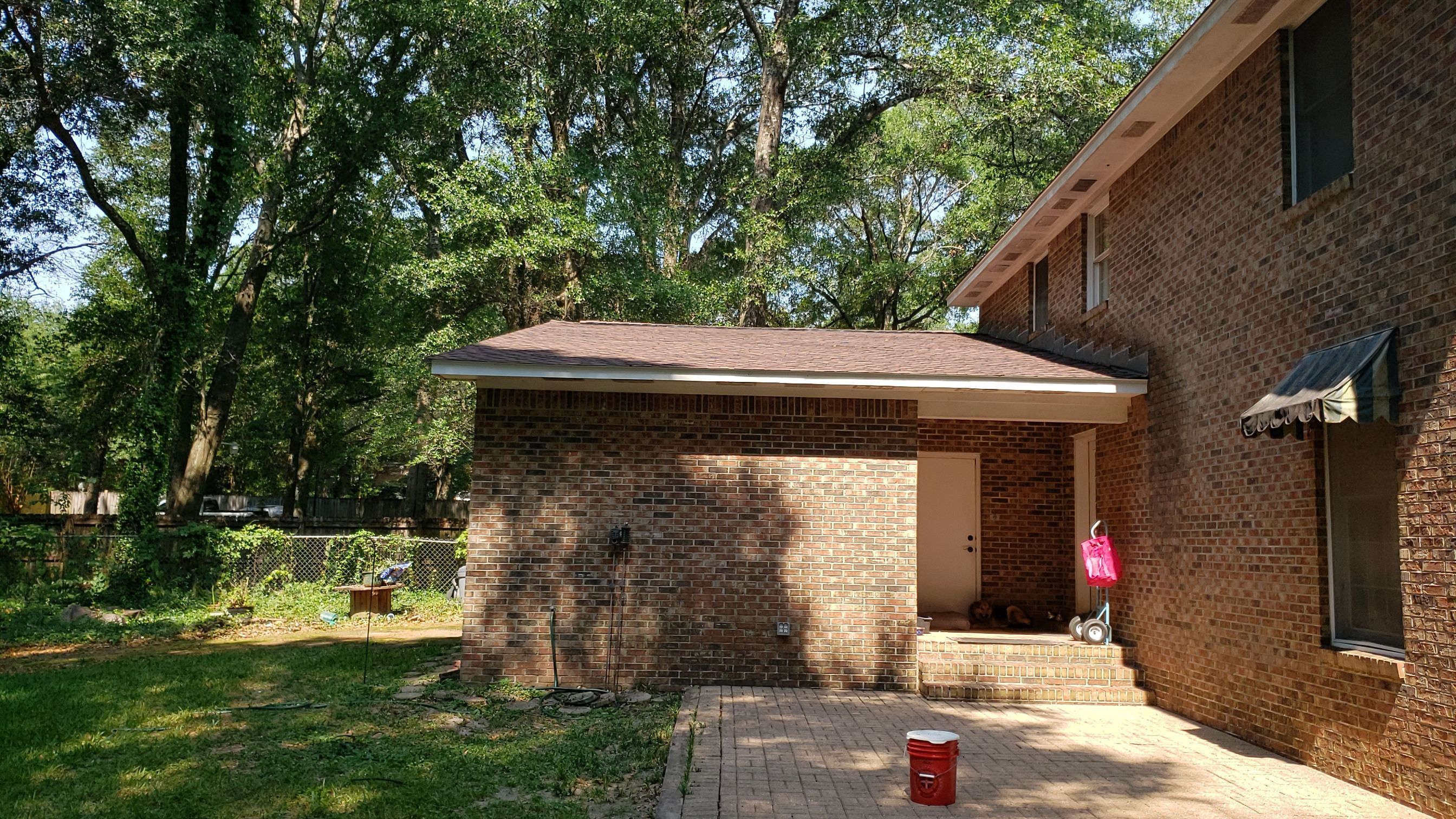 Residential Roofing Installation using Roof Replacement by American Roofing & Construction LLC