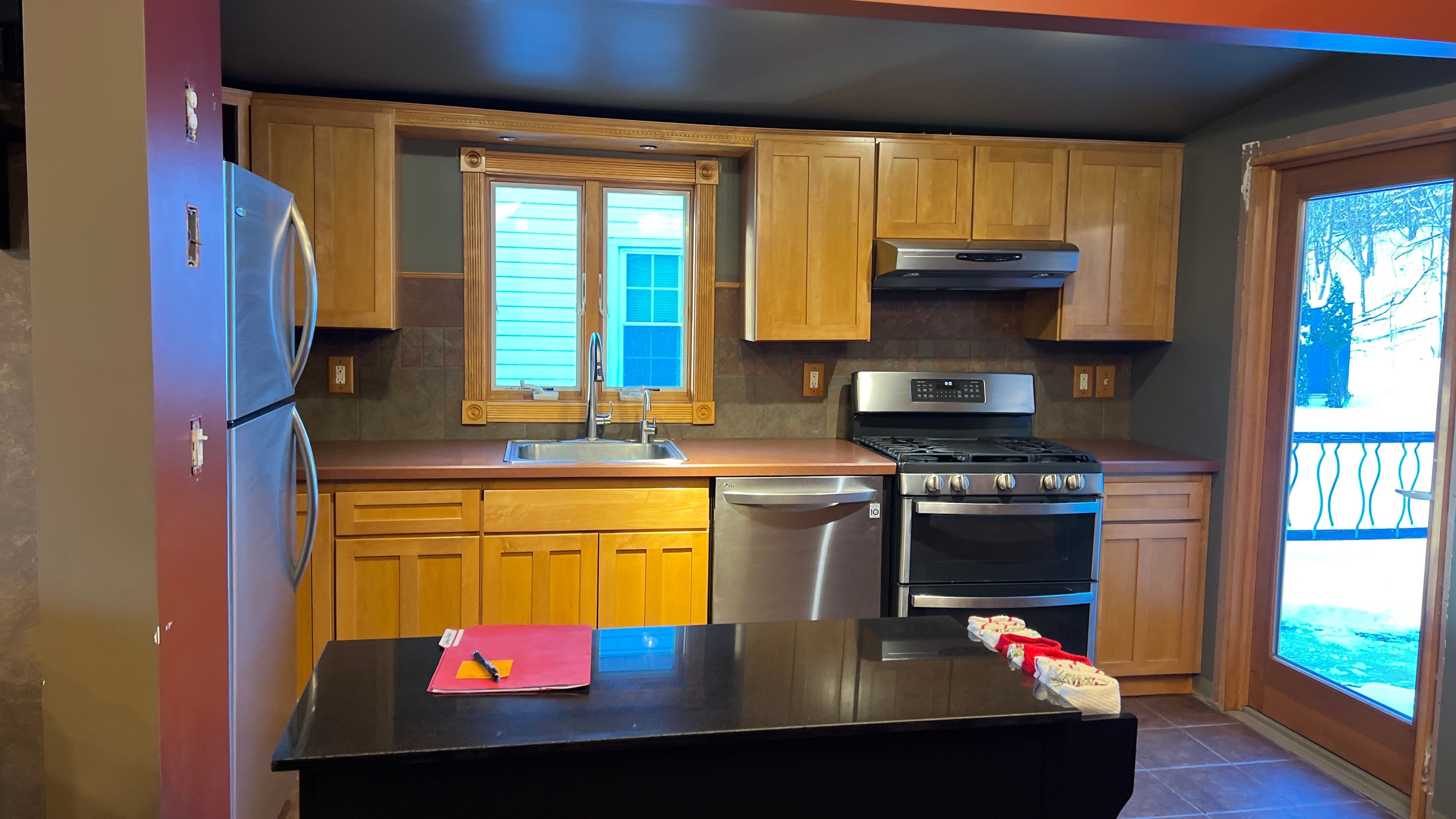 Cabinet Refinishing using Benjamin Moore Command Satin by Spectrum Painting, LLC