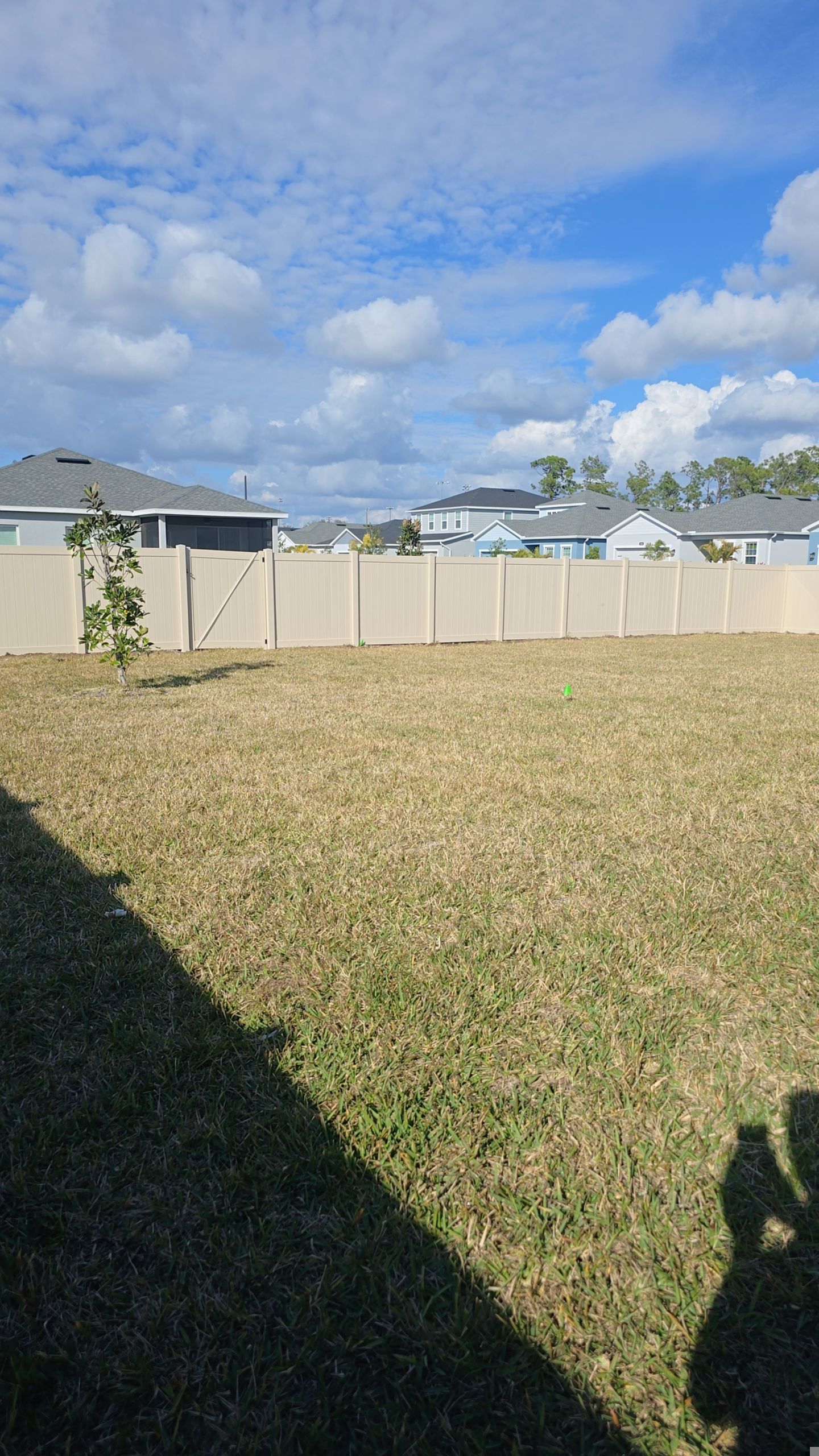 Tan Vinyl Fence in West Port by True Fence LLC