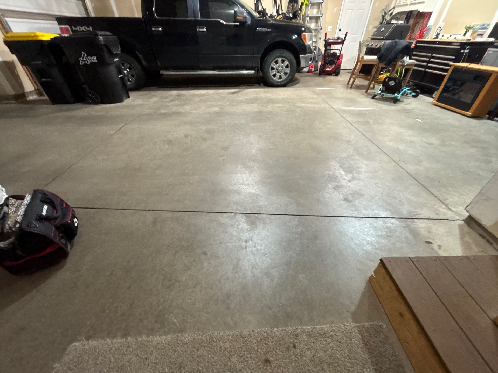 Full Garage Floor Resurfacing and Decorative Epoxy Flake Finish by Select Painting, Coatings & Garage Cabinets