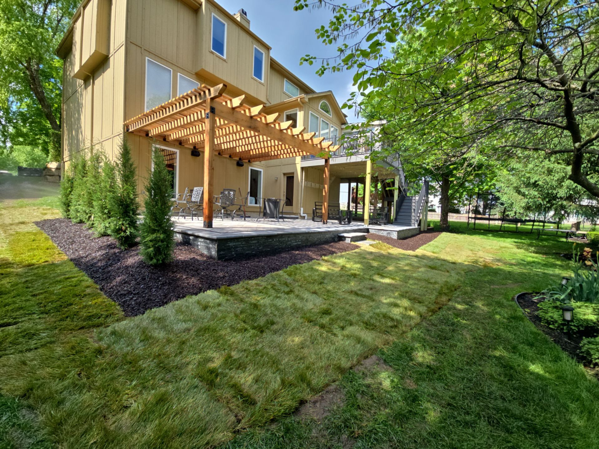 Back Yard Patio, Pergola, and Deck by LAND ESCAPES LLC