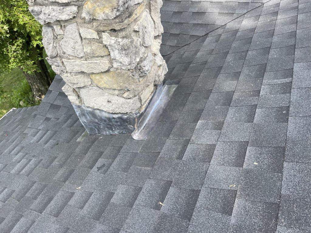 Storm damage roof replacement by Nitro Roofing and Construction