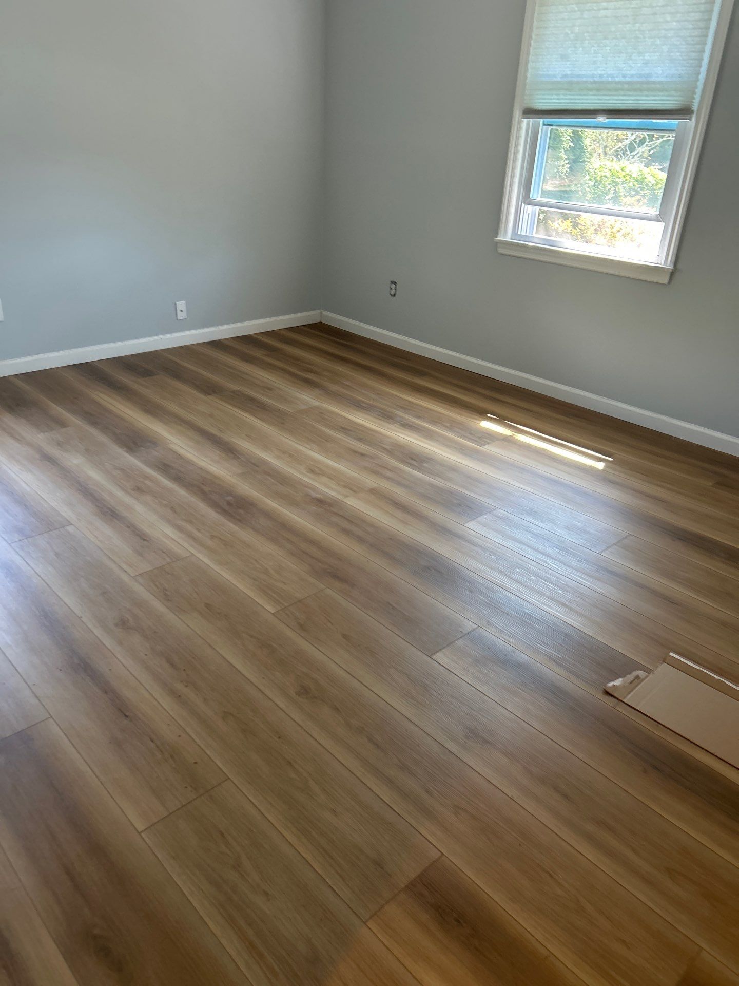 Water Damage Restoration and Full Laminate Floor Installation in Stony Brook by EMS Restoration Corp