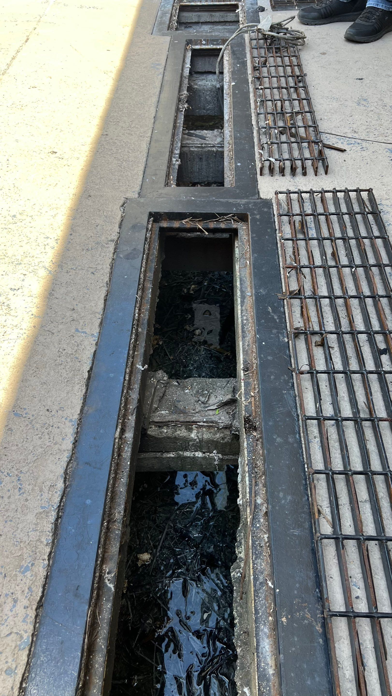 Condo Channel Drain and Sump Pit Cleaning by APS Power & Water