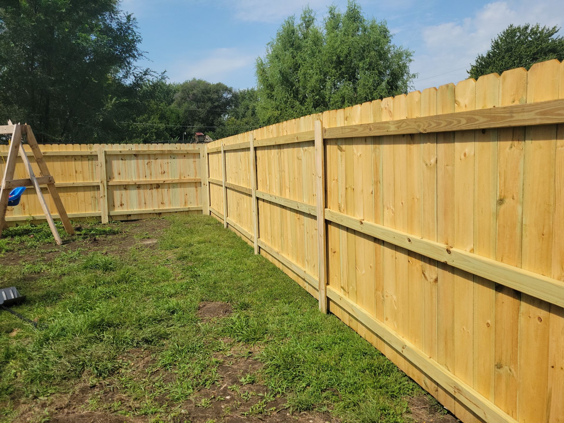 Treated Pine Privacy and Picket Fence Installation in Evansdale by Perfect Picket Fence and Stain