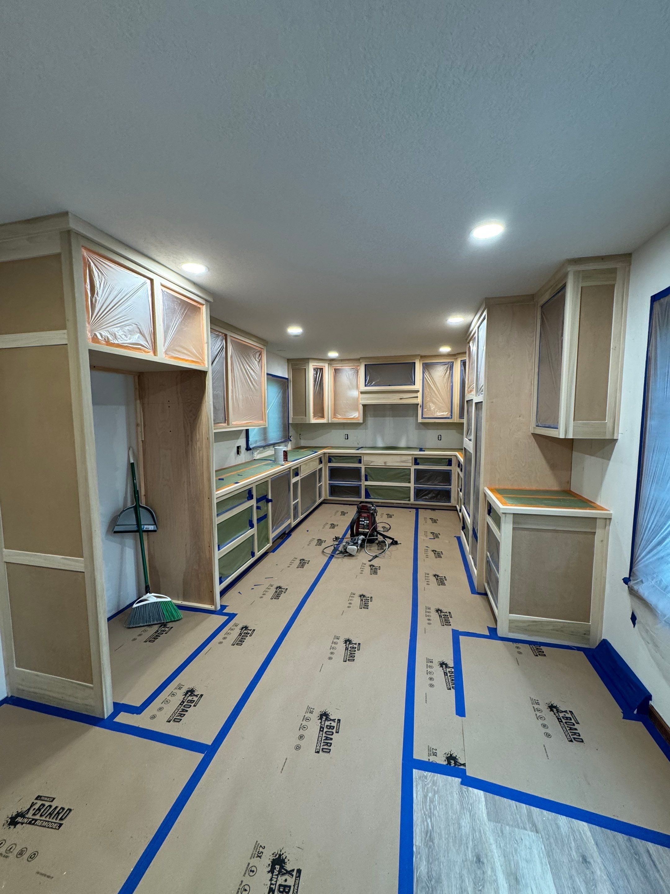 Remodel with new cabinets by Pezley Painting