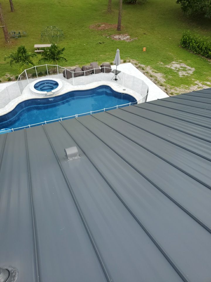 Residential Roofing Installation using 1" Nail strip metal roof by BLUES BROTHERS ROOFING