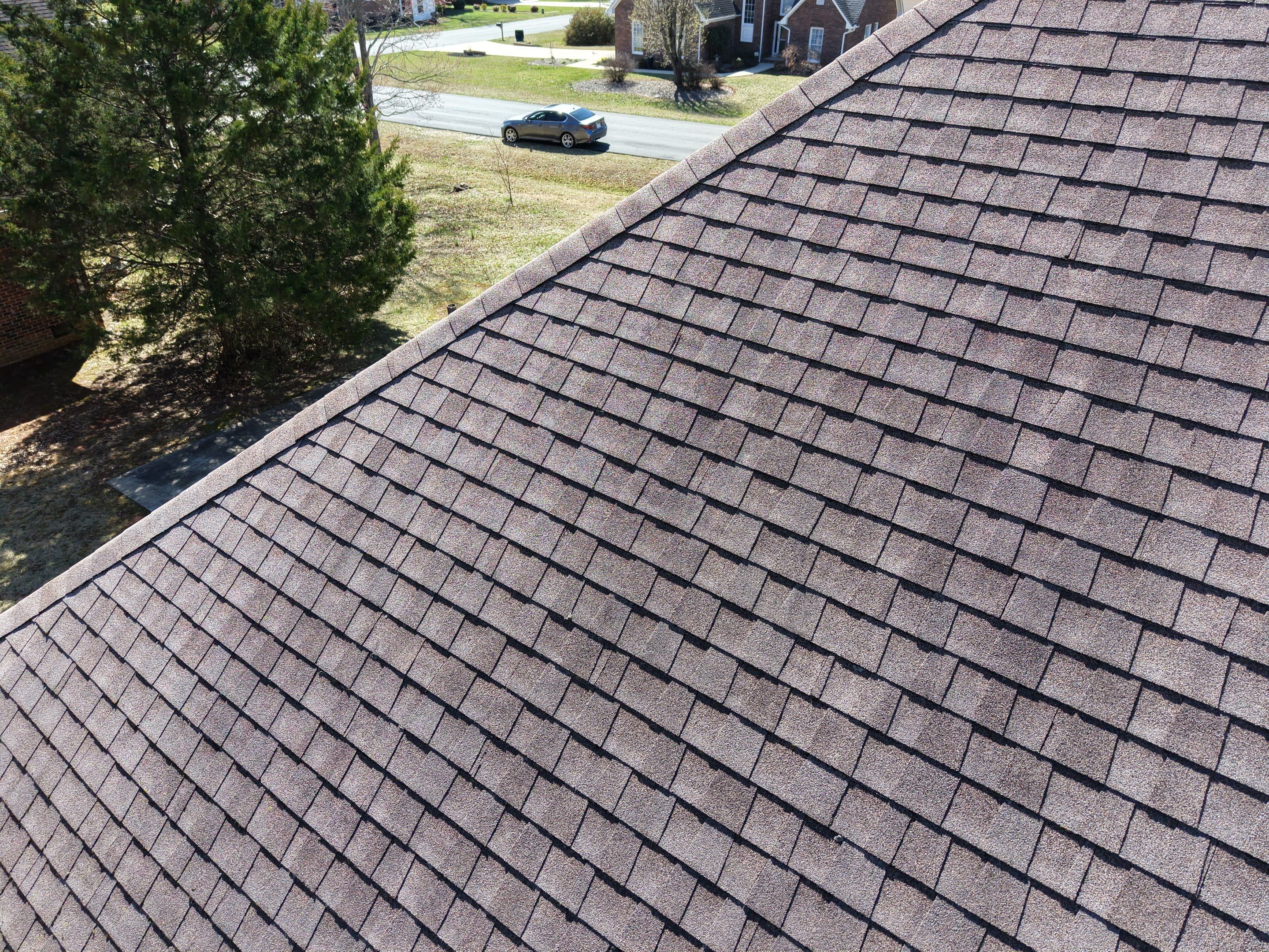 Residential Roofing Installation using TAMKO TITAN XT Rustic Black by RISE Roofing & Restoration, LLC