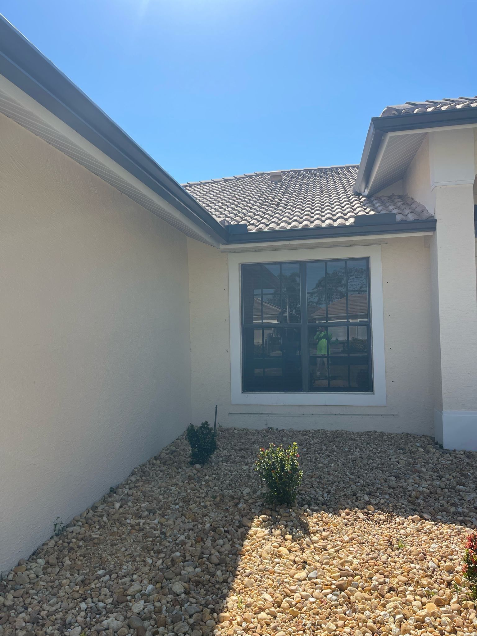 Bronze Seamless Gutters using 3X4 Elbow Downspout in Bonita Springs FL by Gutter Professors