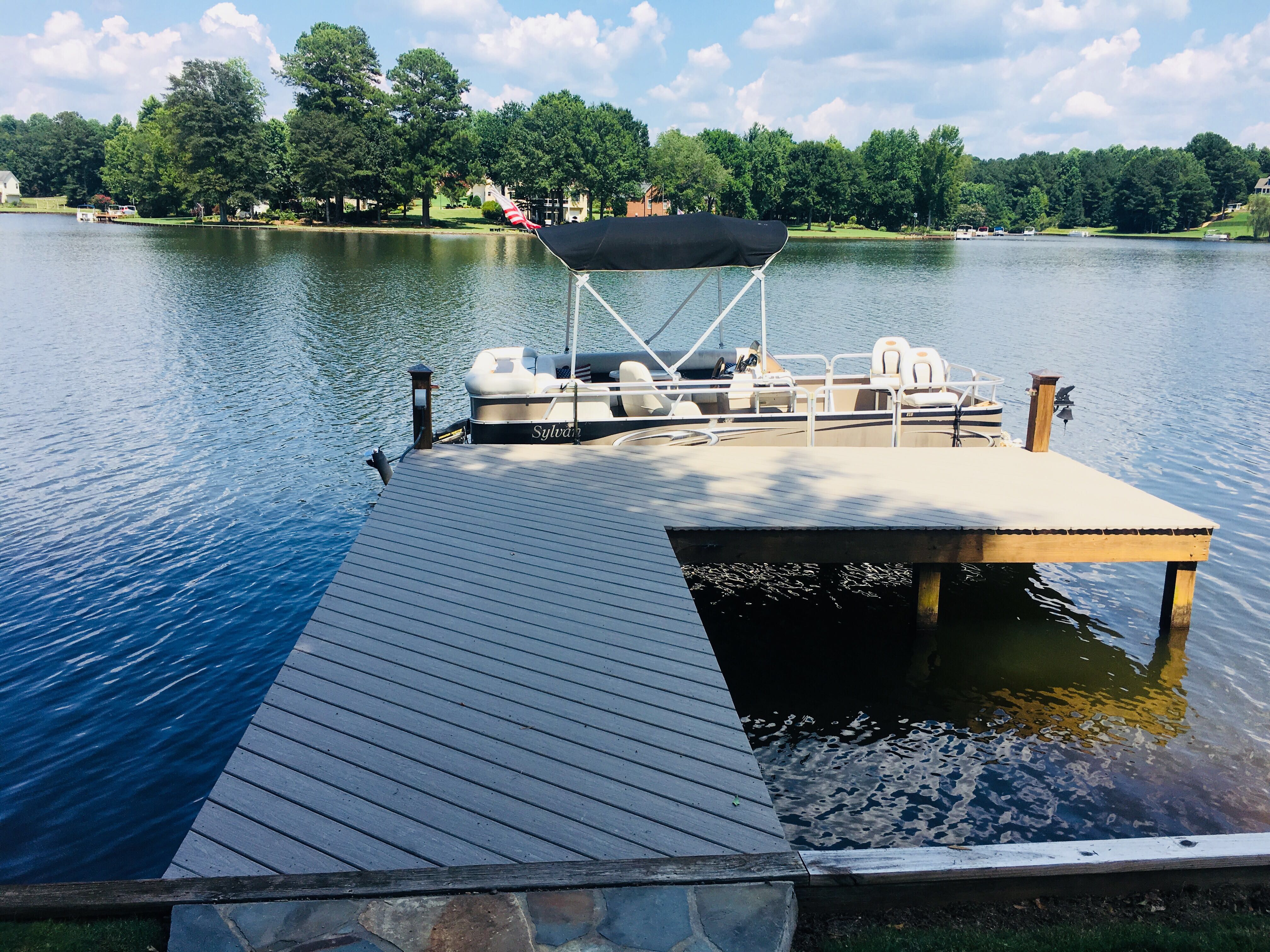 Elevated Composite Deck and Screened Porch Construction in Newnan by Swift Home Renovations