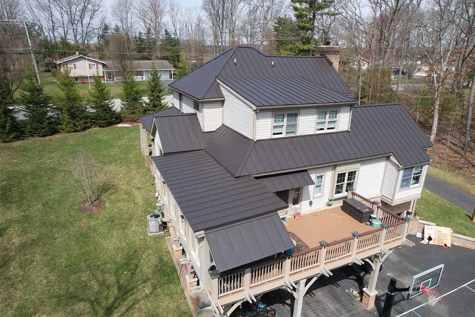 Metal Roof Replacement  by American Home Contractors
