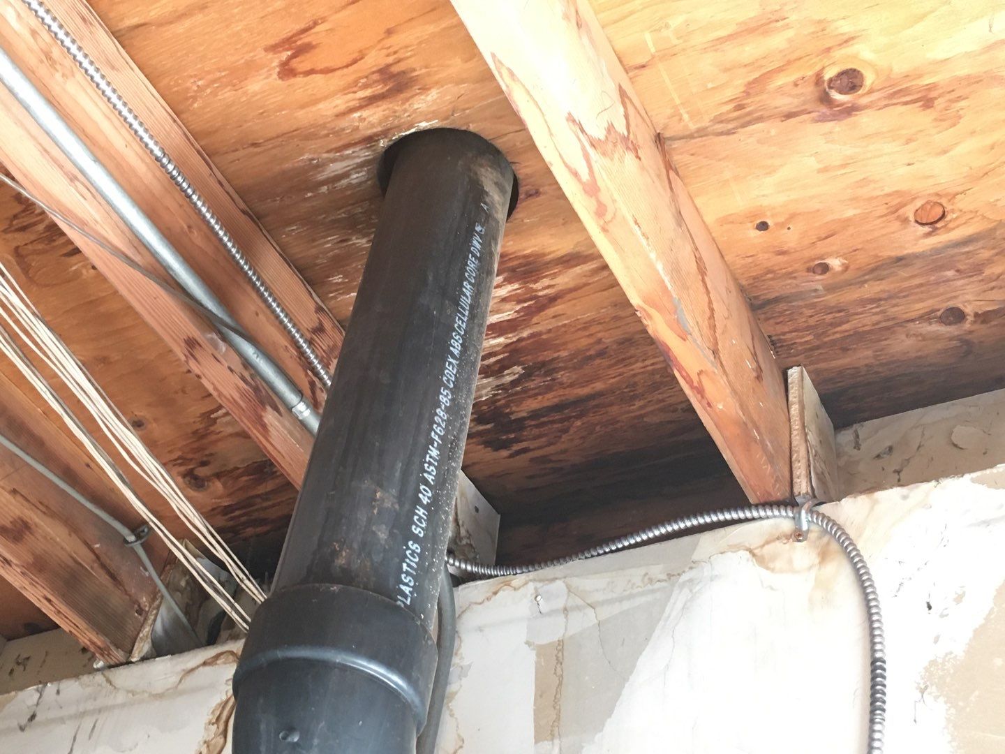 Spray foam and coatings inside commercial building HVAC well using Spray foam and coatings over existing BUR system by Straight Edge Roofing Inc