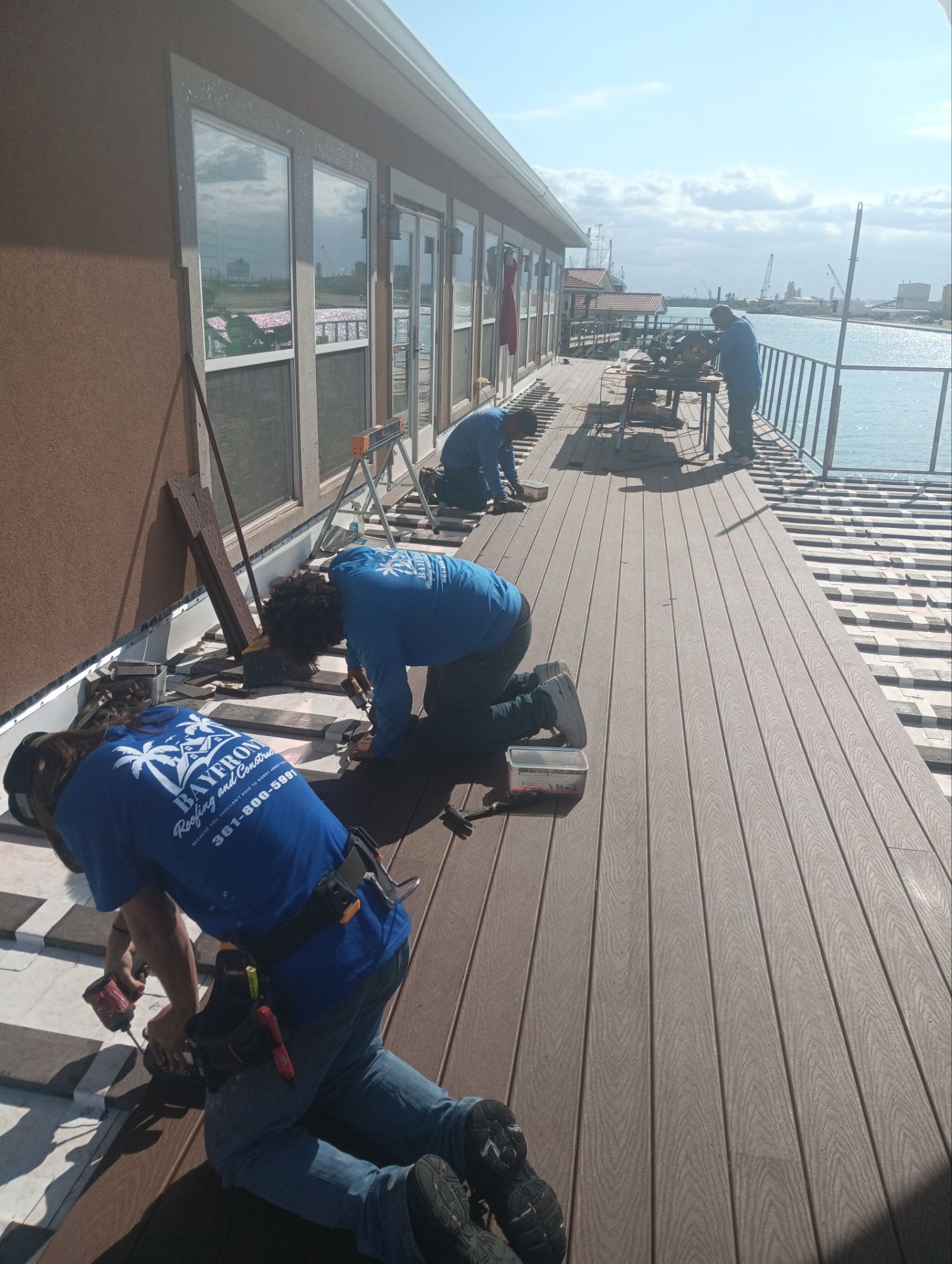 Walk Out Patio Cover by Bayfront Roofing and Construction