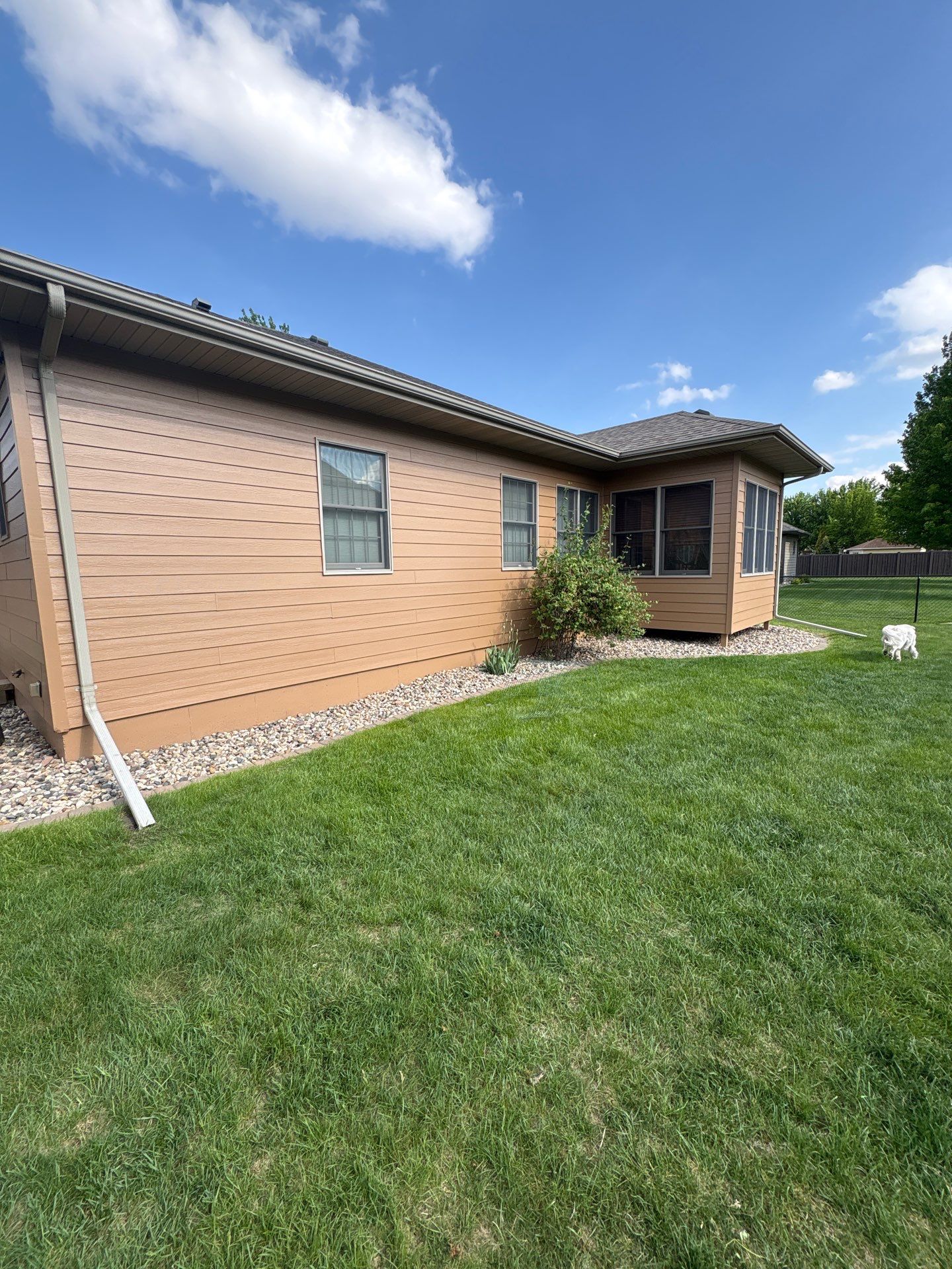 Sioux Falls Residential Exterior Door and Siding Refresh by Select Painting, Coatings & Garage Cabinets