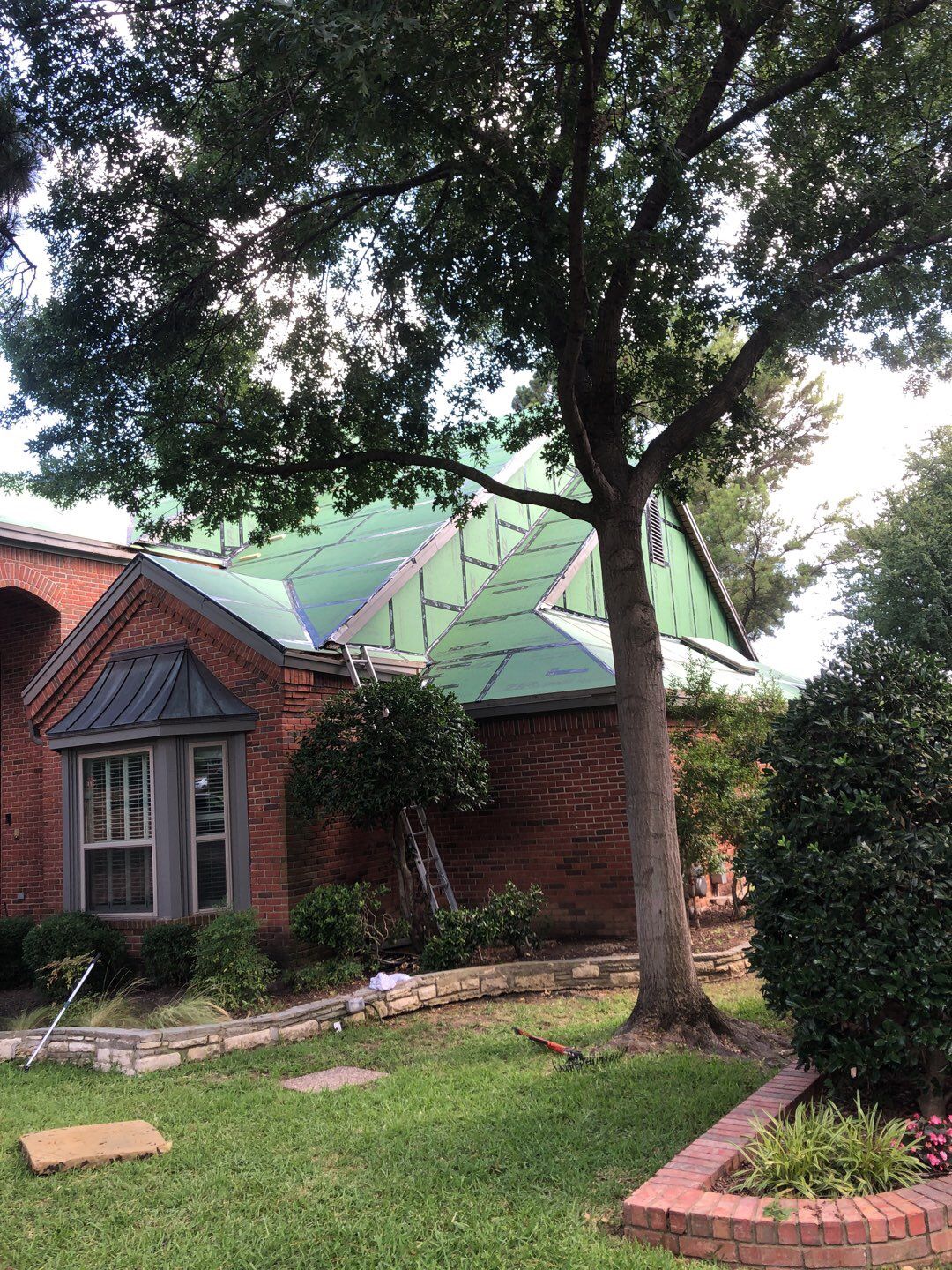 Designer Residential Roof with Zip System by Springtree Restoration
