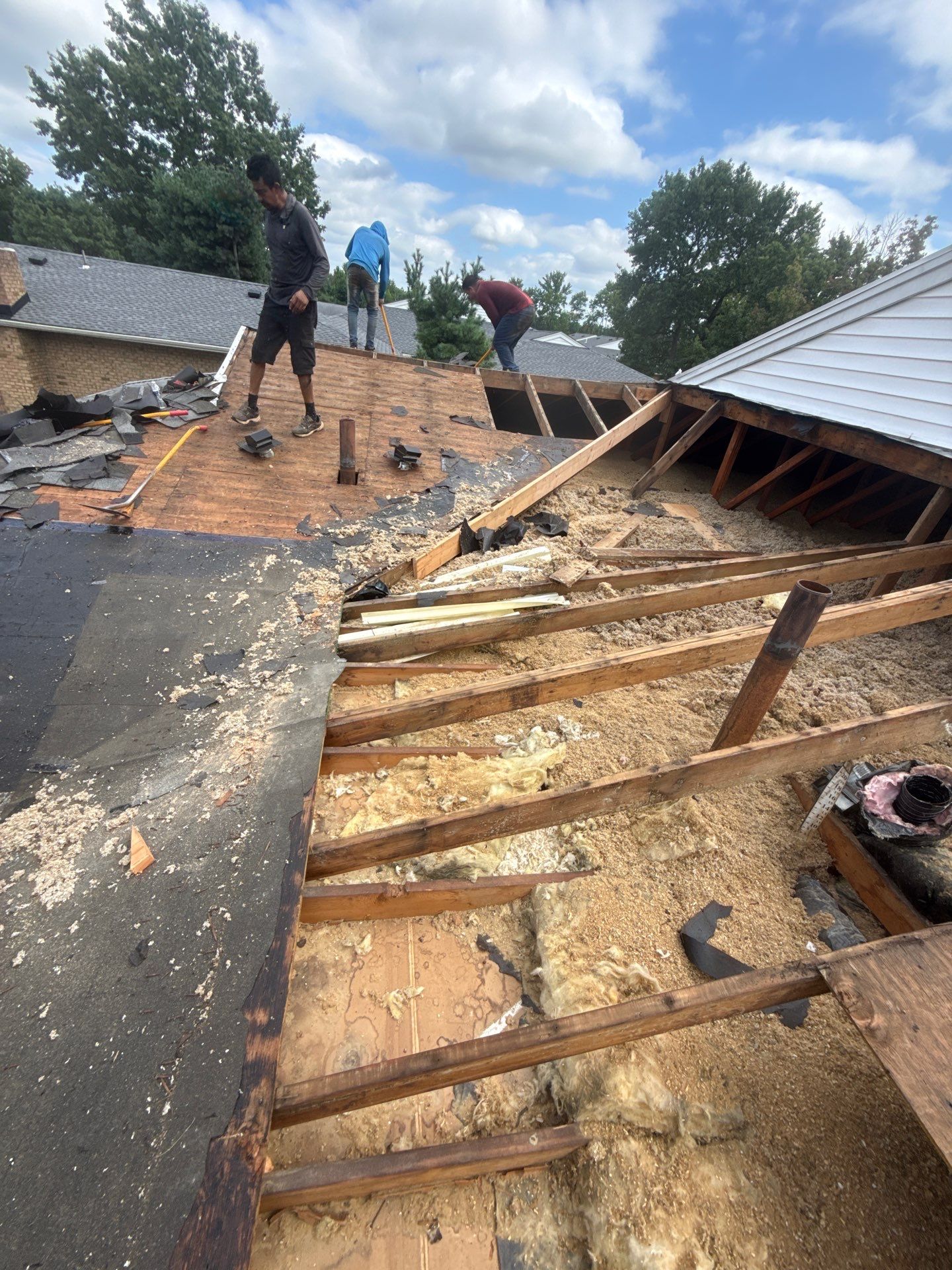 Apartment Complex Roof Replacement and Decking Repair in North Brunswick by JVW ROOFING