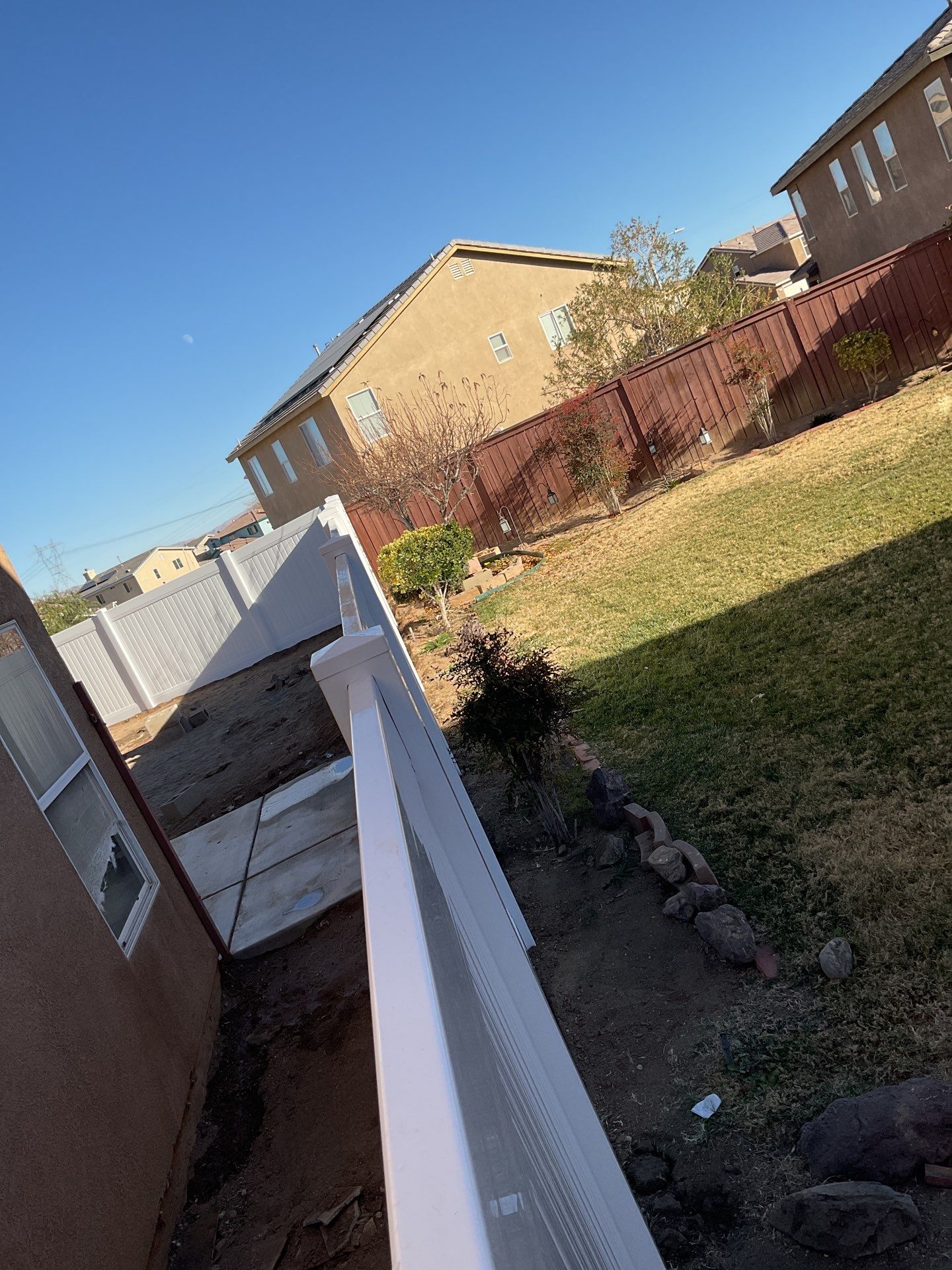 Fence installation using wood by Fence Guys Inc.