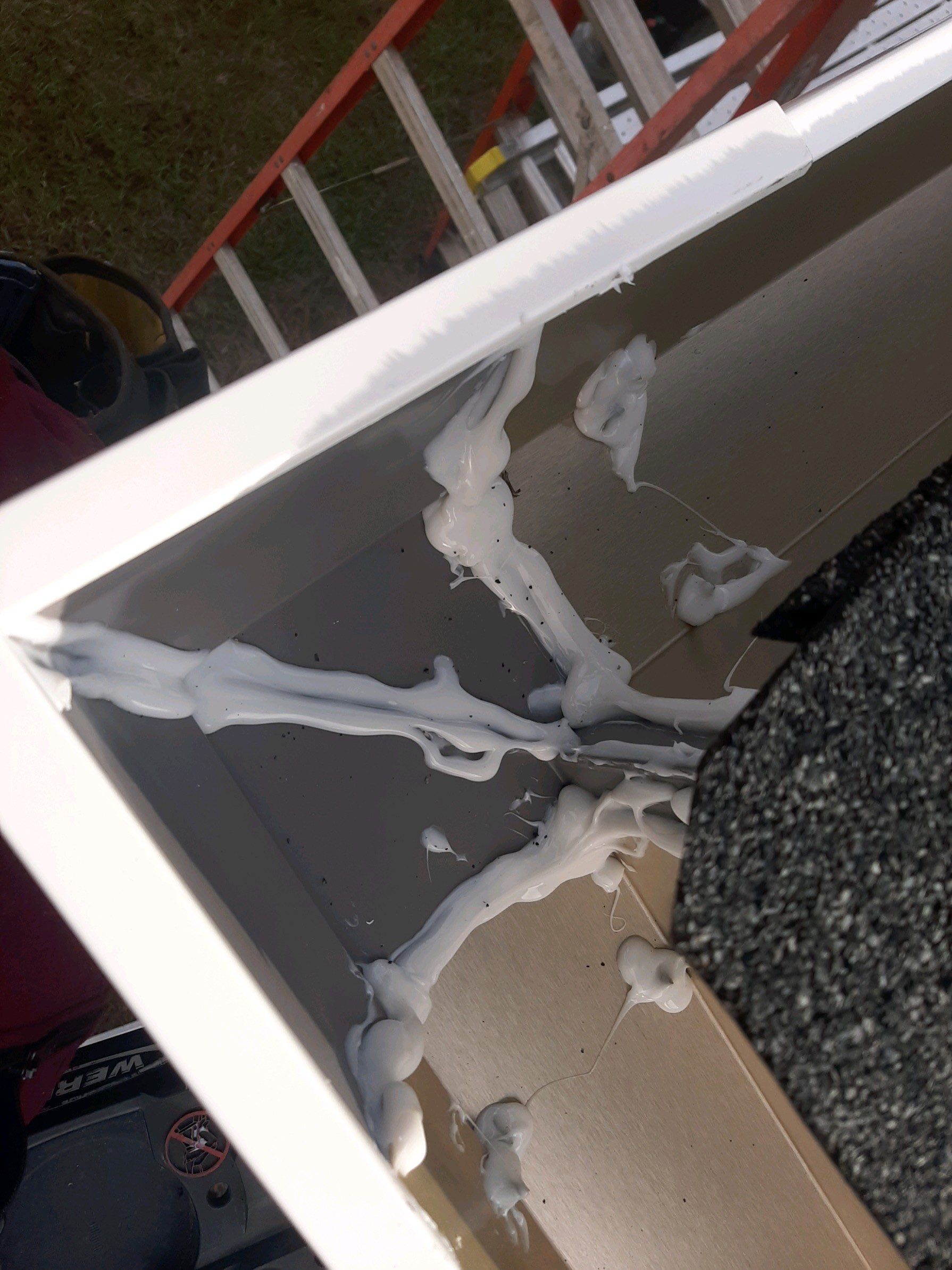 Seamless Gutter Installation Using White K-Style Gutters by Gutter Professors
