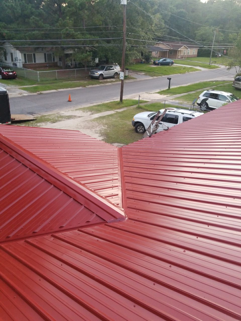 Residential Roofing Installation using Metal roofing by American Roofing & Construction LLC