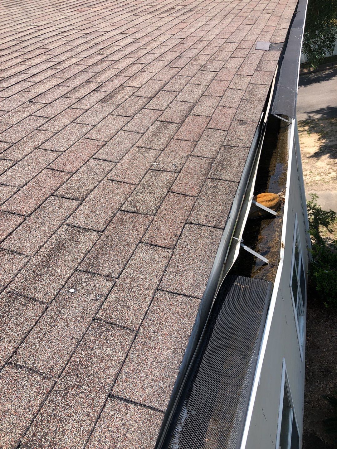 Residential Roofing Installation using Roof Replacement by American Roofing & Construction LLC