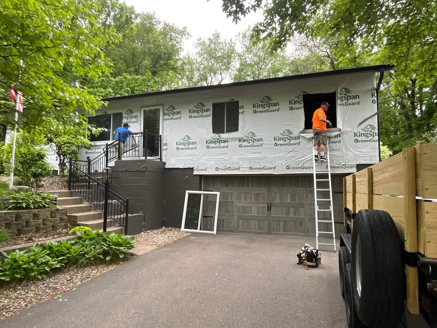 Premium Exterior Remodel – Alside Charter Oak Siding, Hayfield Black Frame Windows, Edco Soffit & Fascia by First Impressions Exteriors