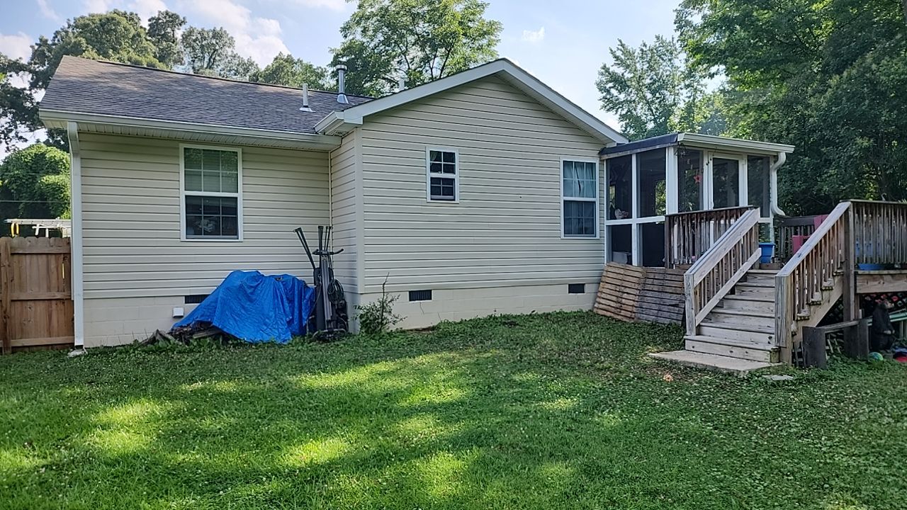 House Wash using cleaner by Power Wash Masters LLC