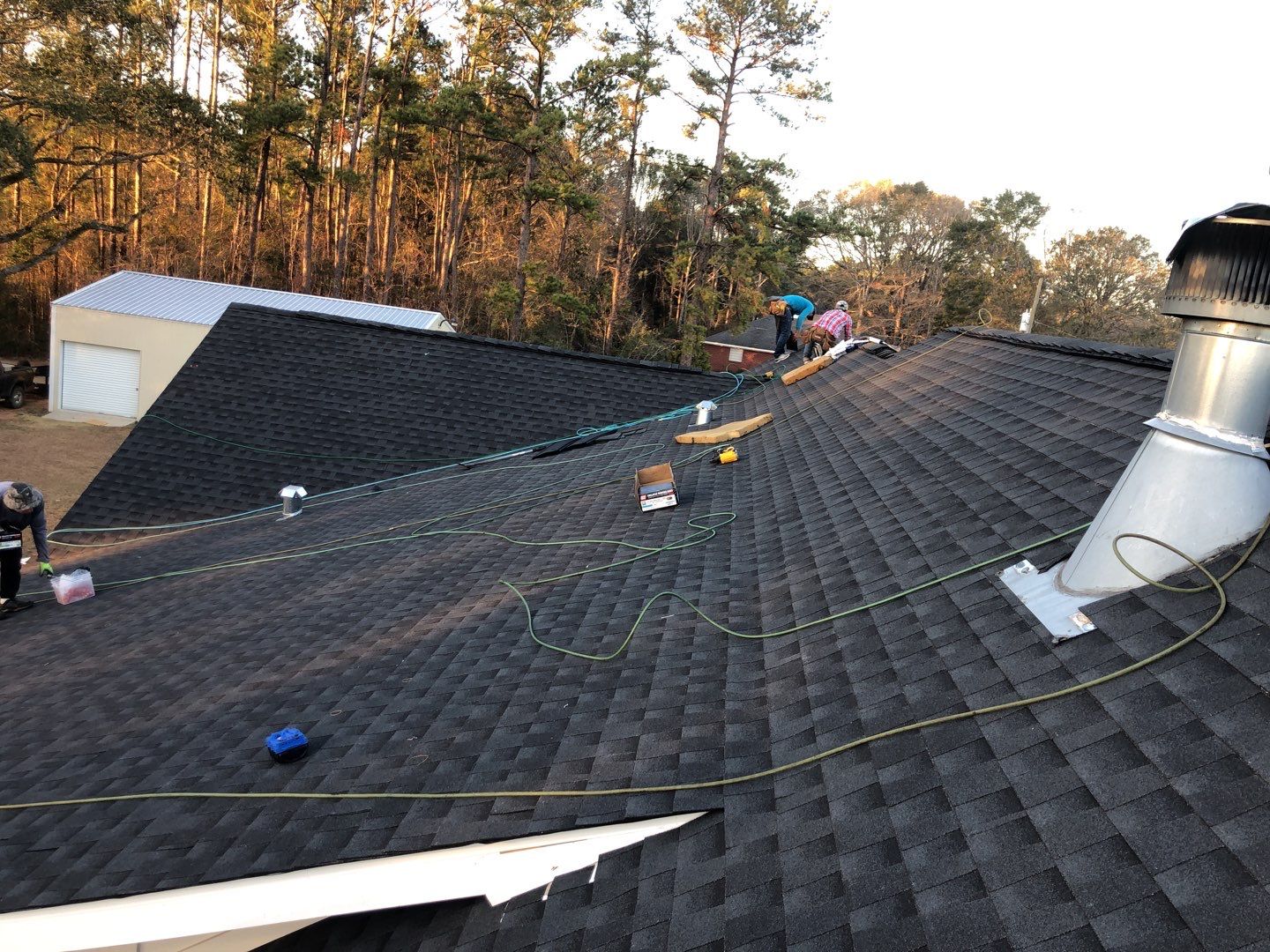 Residential Roofing Installation using Roof Replacement by American Roofing & Construction LLC