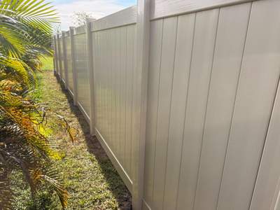 Residential Tan Vinyl Privacy Fence Installation in Nokomis