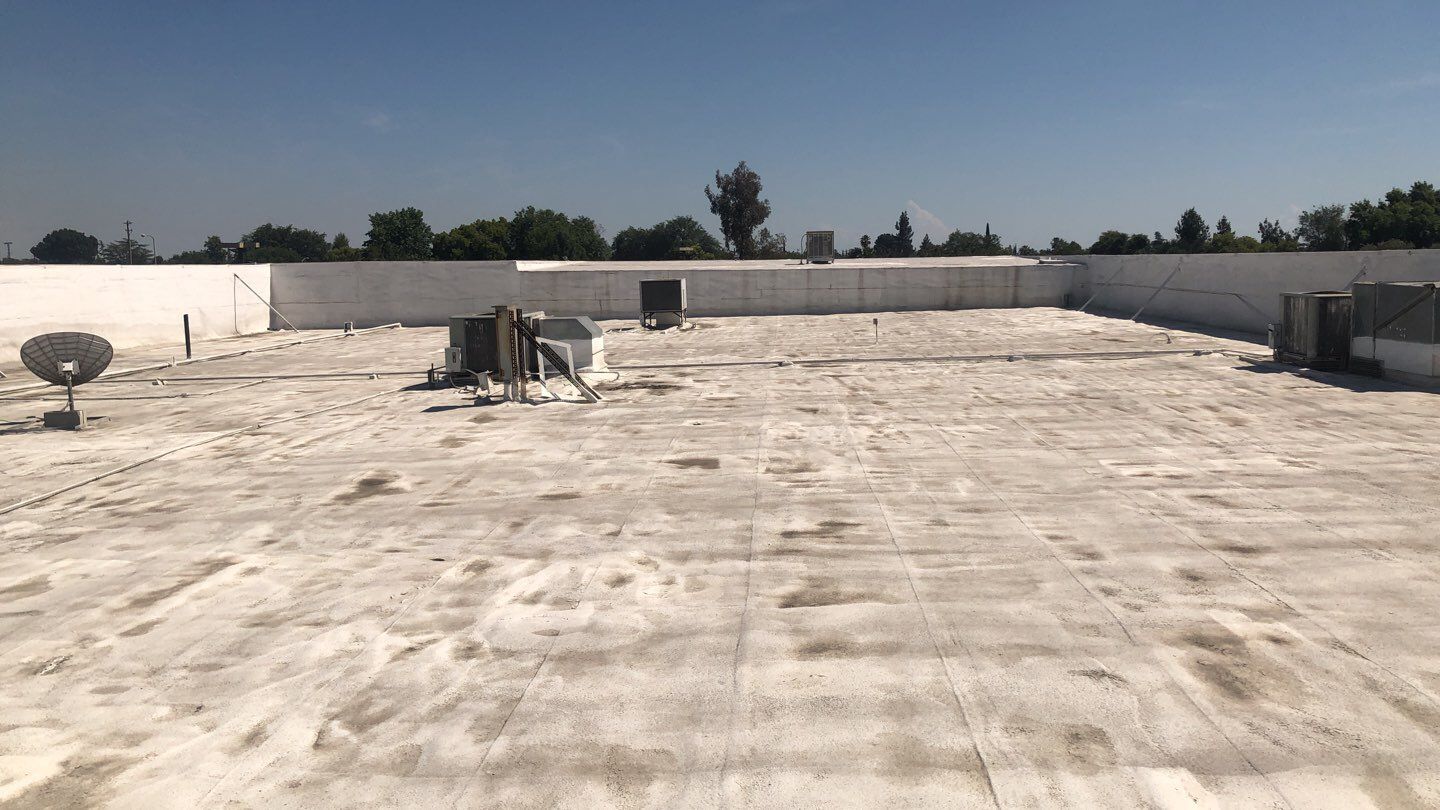 Reburbish existing spray foam job by Straight Edge Roofing Inc