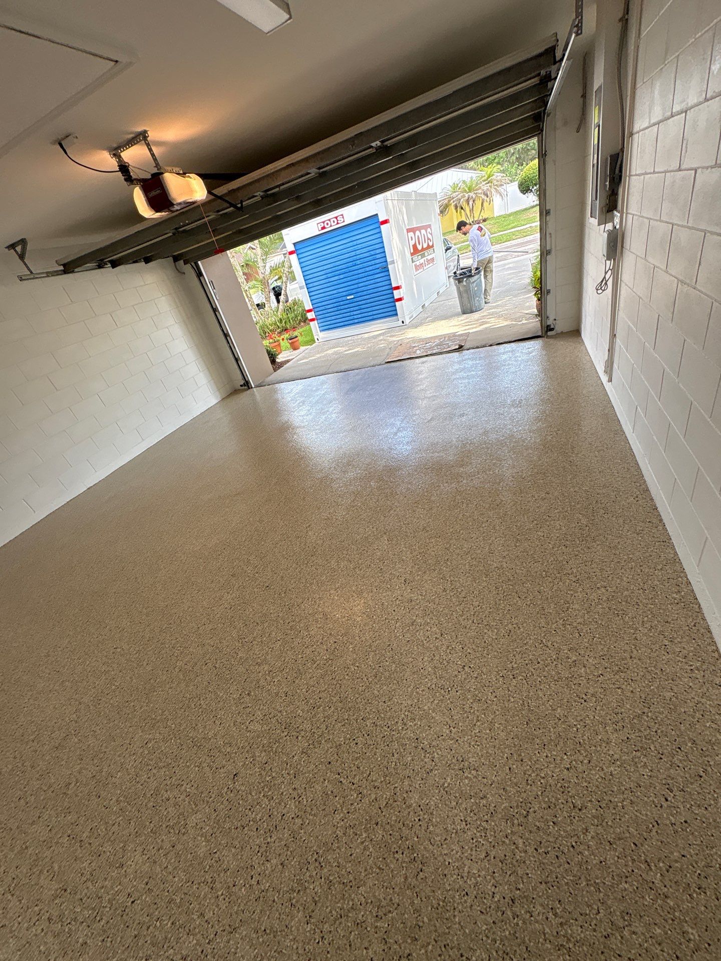 Garage and Screened Lanai Epoxy Floor Coating in Brandon by Performance Floors & Coating