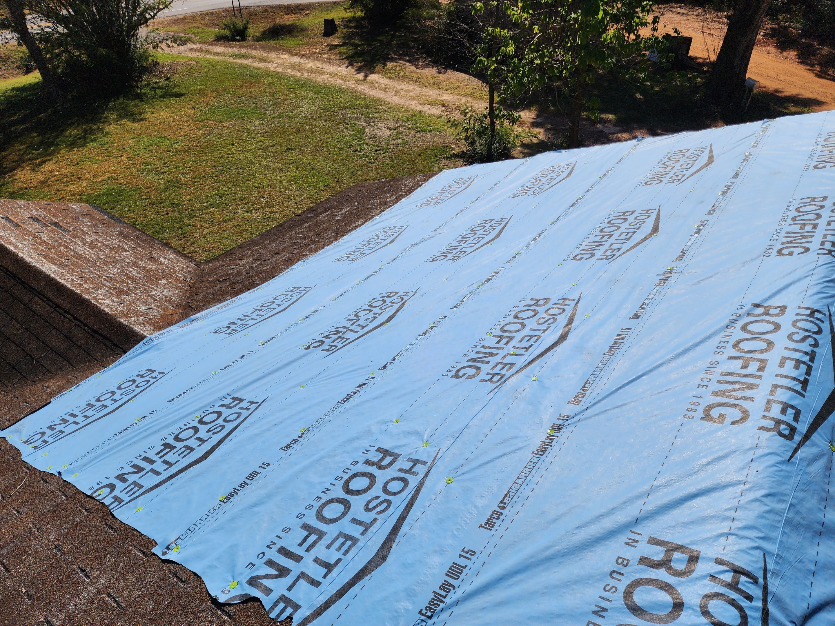 Residential Roofing Repair using Malarkey Highlander: Natural Wood by Hostetler Roofing