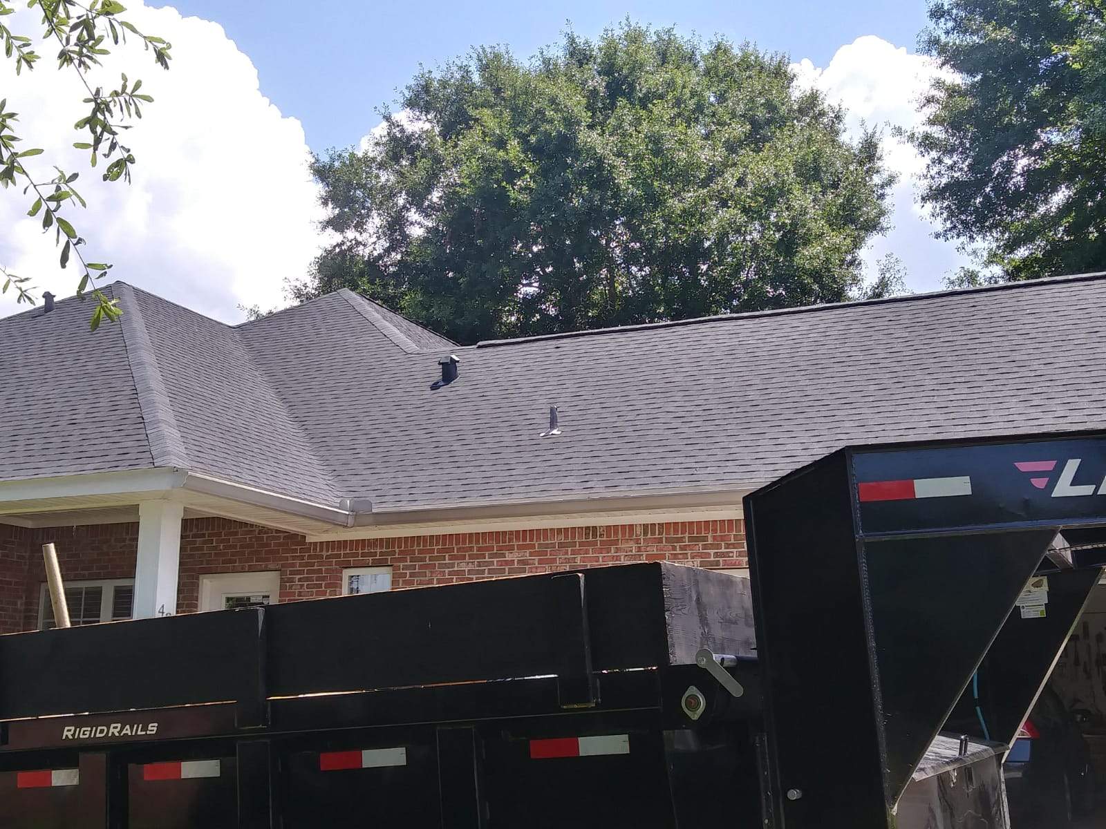 Residential Roofing Installation using Roof Replacement by American Roofing & Construction LLC