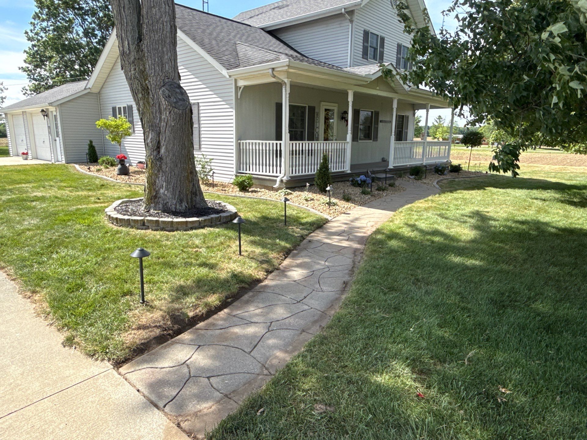 Custom Landscaping, Lighting, & Drip Irrigation Installation in Bryan by Farrell's Lawn & Garden Center LLC