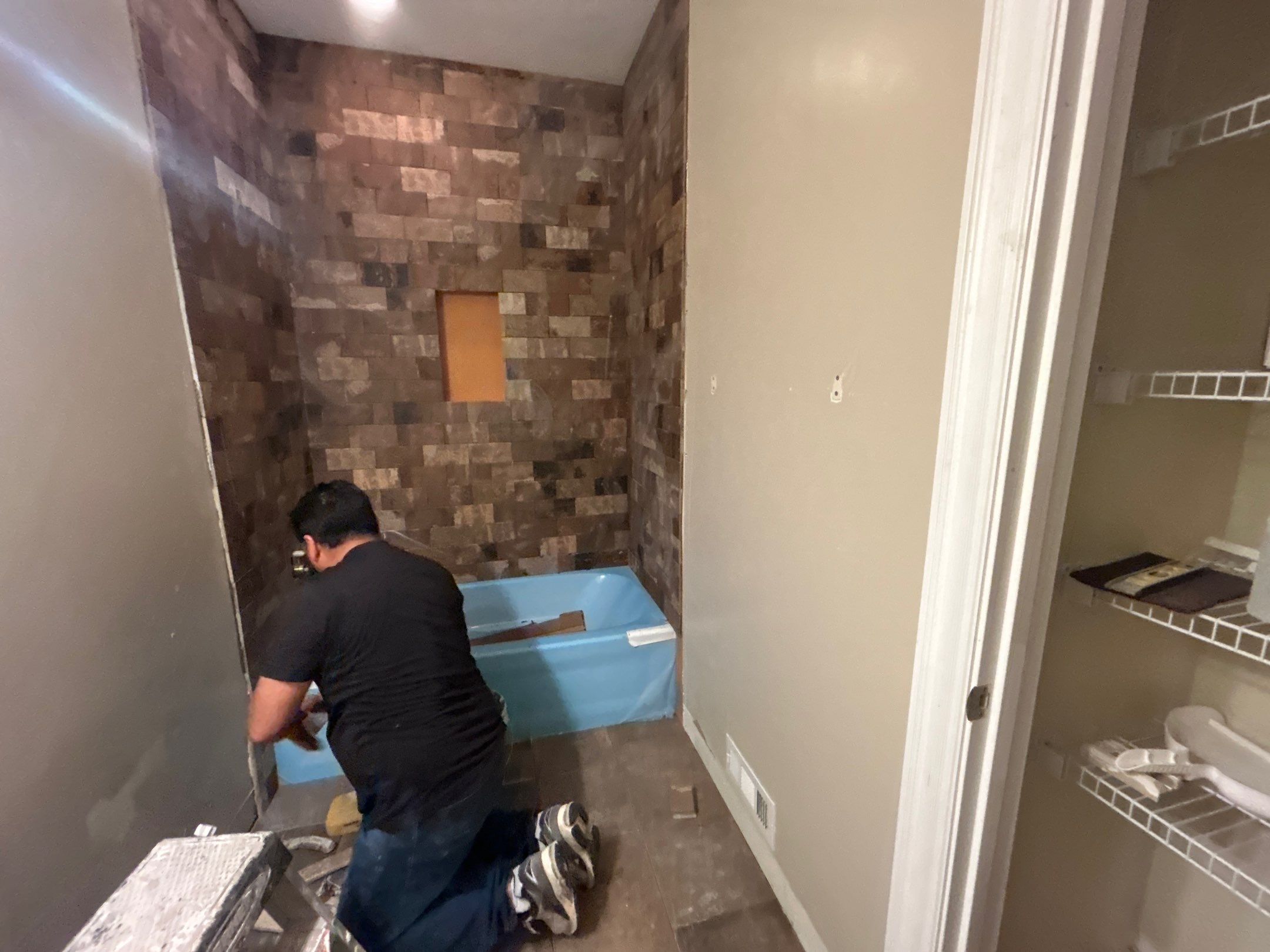 Tub Surround and Bathroom Floor by Footprints Floors Kentucky