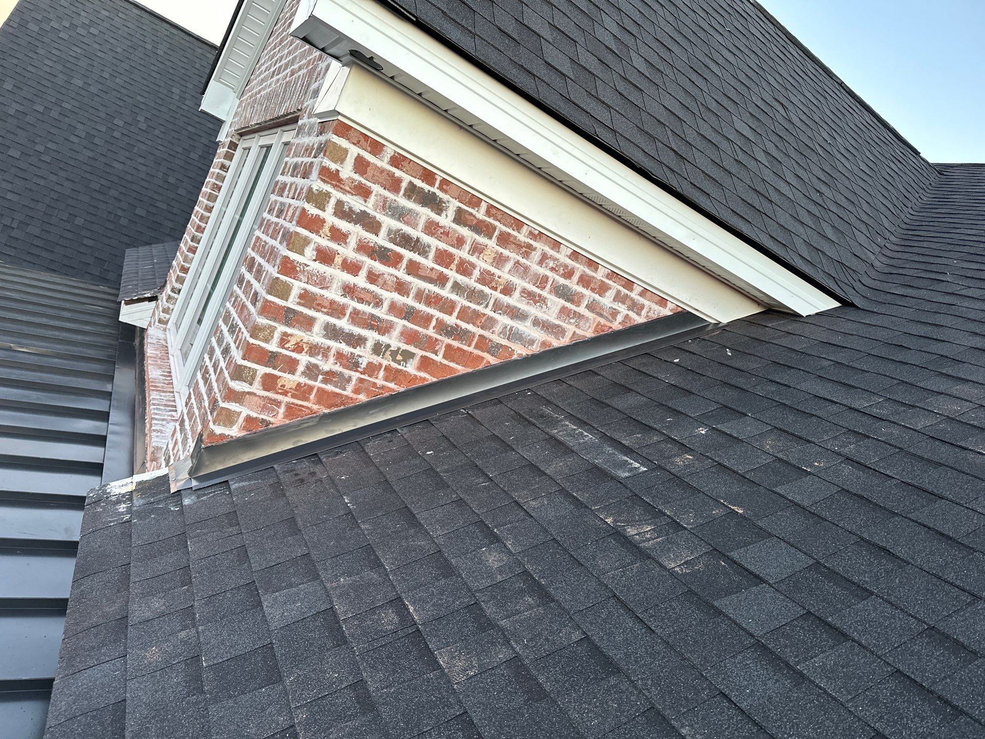 Residential Roofing Installation using Tamko Heritage AR with Standing Seam Metal Porch by Undersun Roofing 