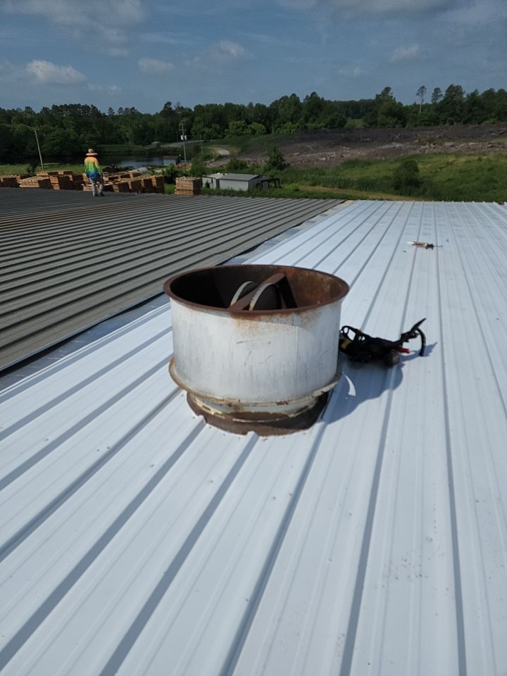 Commercial Roofing Installation using Aluminum Roofing panels by Hostetler Roofing