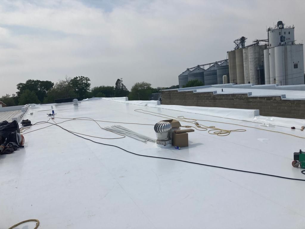 Recover of a downtown building  by Grell Roofing, LLC