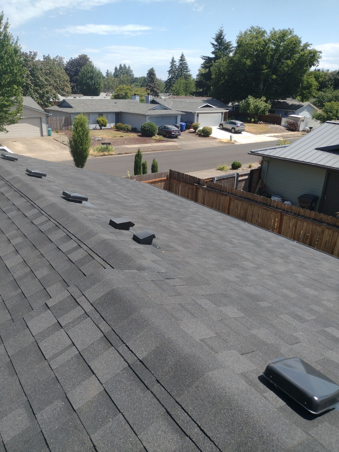 Residential Roofing Installation using IKO Dynasty (Color: Granite Black) by Orezona Building & Roofing Company, Inc.
