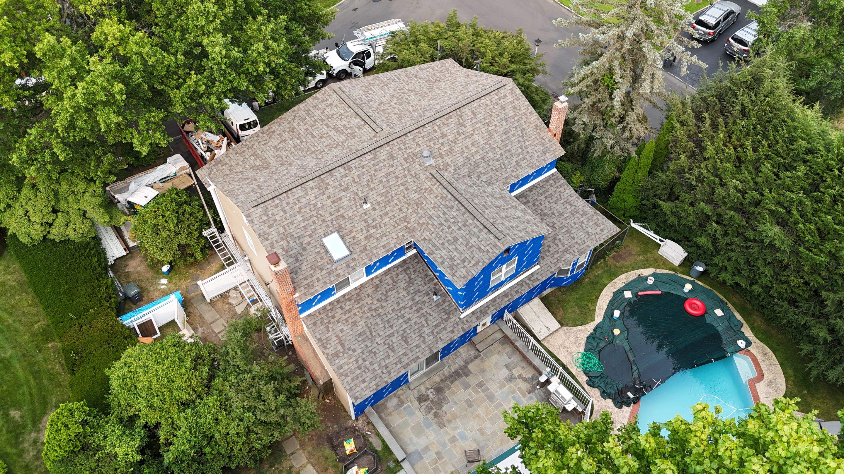 Project in White Plains by The Energy Efficient Roofer & George's Seamless Gutters