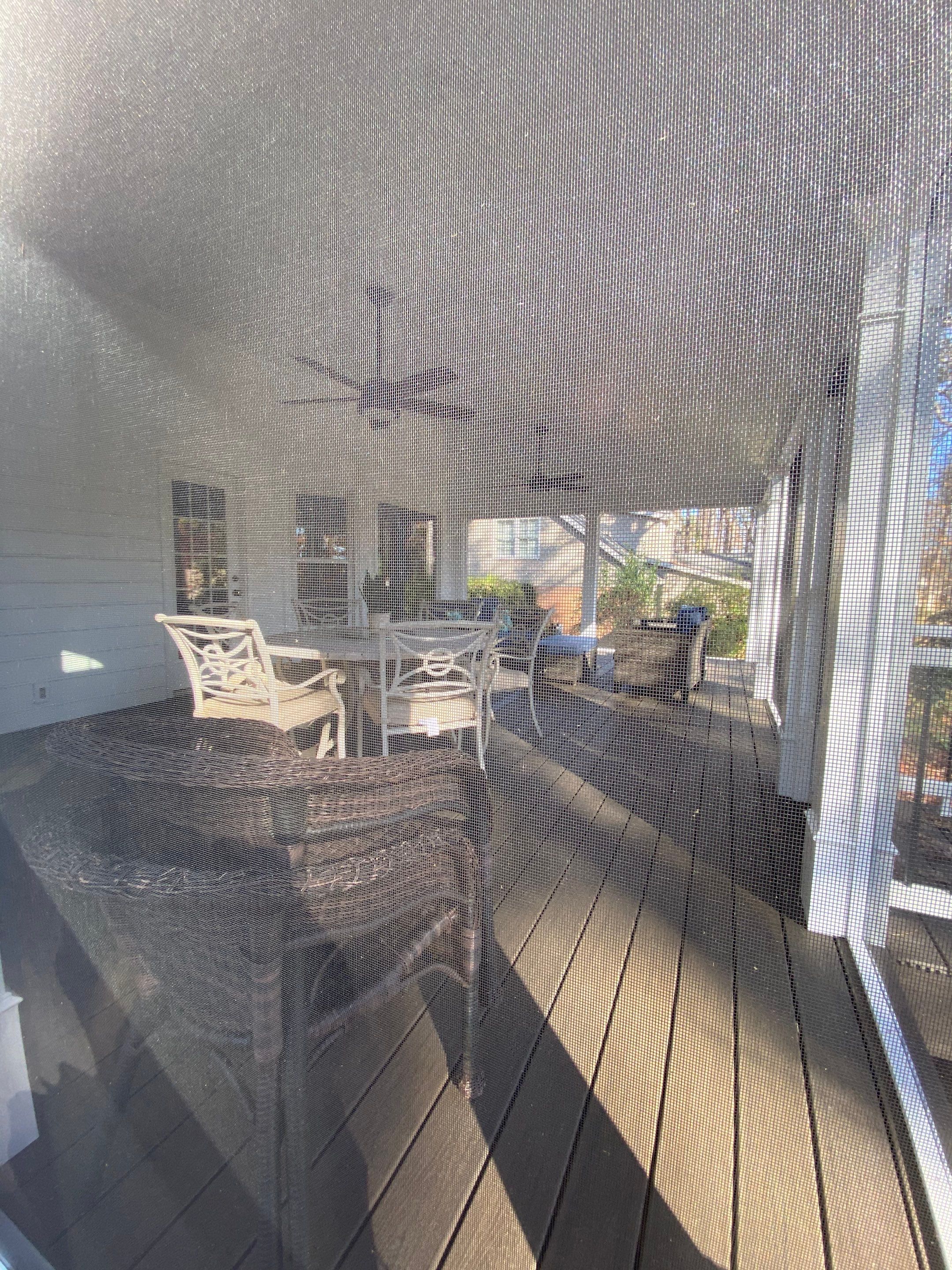 Custom Screened Porch with Beadboard Ceiling and Composite Decking by Swift Home Renovations