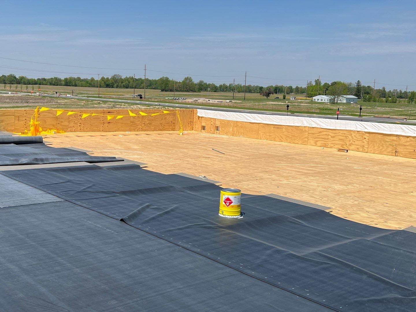 Commercial Roofing Installation using 60 mil rubber roof  by Nitro Roofing and Construction